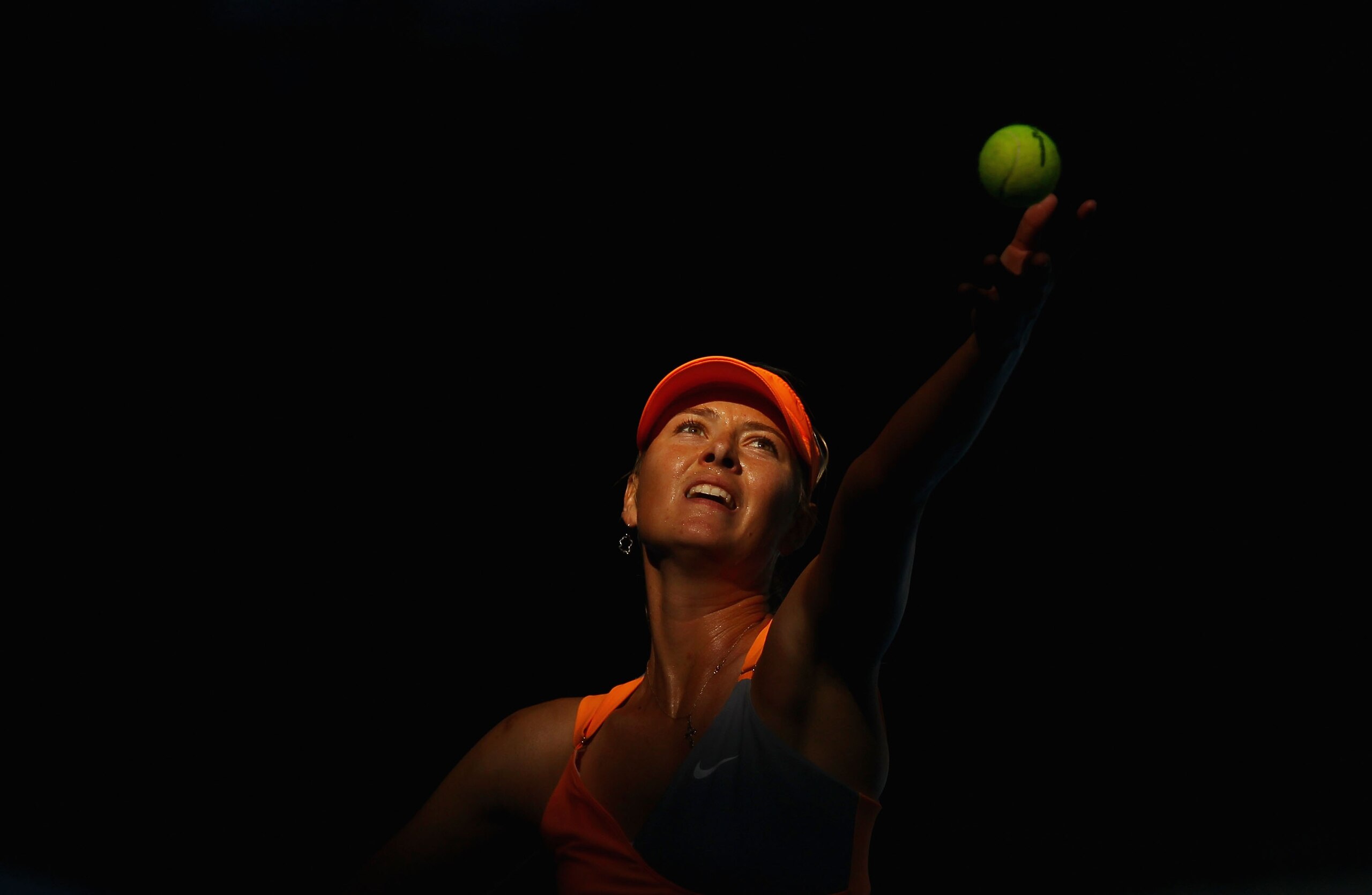 MELBOURNE, AUSTRALIA - JANUARY 21:  Maria Sharapova of Russia serves in her third round match against Julia Goerges of Germany during day five of the 2011 Australian Open at Melbourne Park on January 21, 2011 in Melbourne, Australia.  (Photo by Julian Fin