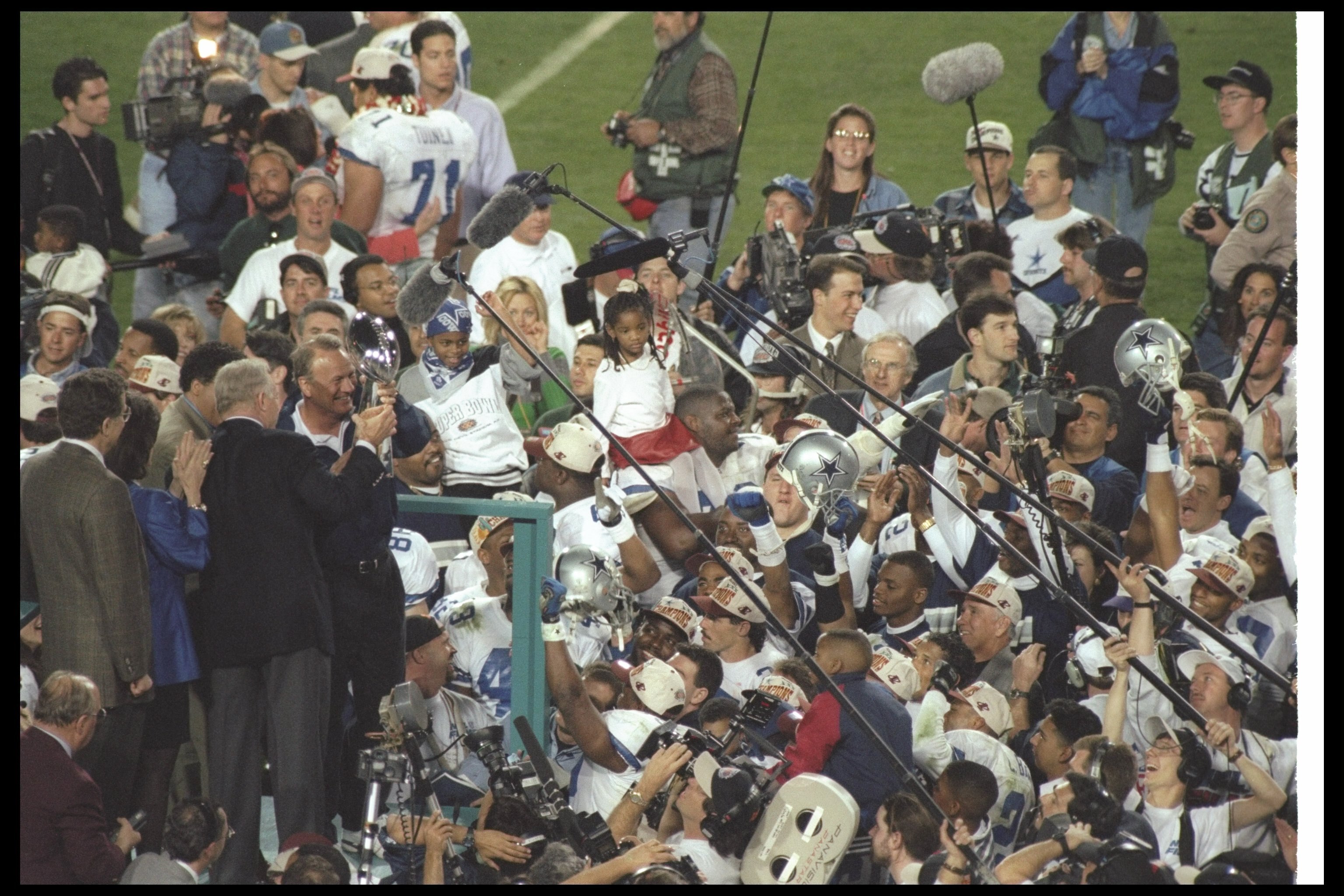 28 Jan 1996:  Dallas Cowboys owner Jerry Jones and head coach Barry Switzer celebrate after Super Bowl XXX against the Pittsburgh Steelers at Sun Devil Stadium in Tempe, Arizona.  The Cowboys won the game, 27-17. Mandatory Credit: Otto Greule Jr.  /Allspo
