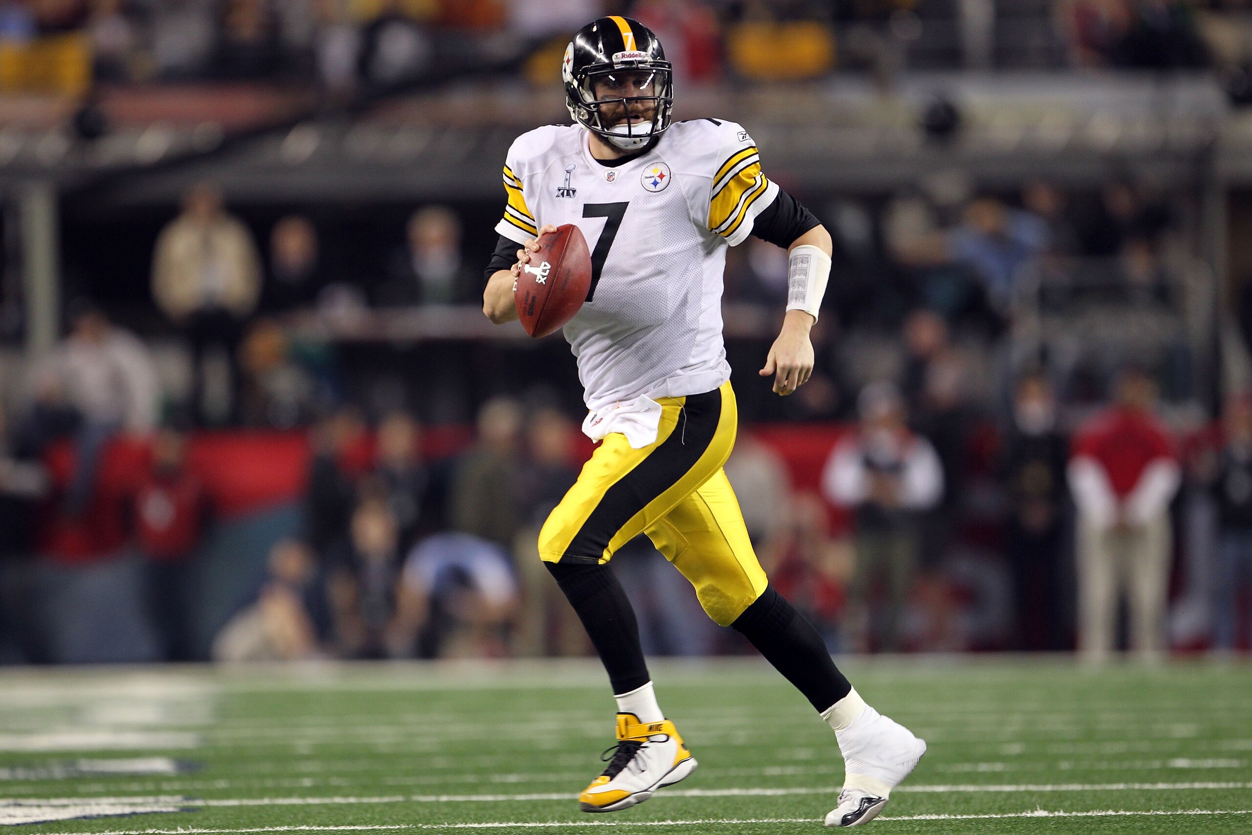 ARLINGTON, TX - FEBRUARY 06: Ben Roethlisberger #7 of the Pittsburgh Steelers rolls out to pass against the Green Bay Packers during Super Bowl XLV at Cowboys Stadium on February 6, 2011 in Arlington, Texas. (Photo by Jamie Squire/Getty Images) ARLINGTON, TX - FEBRUARY 06: Ben Roethlisberger #7 of the Pittsburgh Steelers rolls out to pass against the Green Bay Packers during Super Bowl XLV at Cowboys Stadium on February 6, 2011 in Arlington, Texas. (Photo by Jamie Squire/Getty Images)