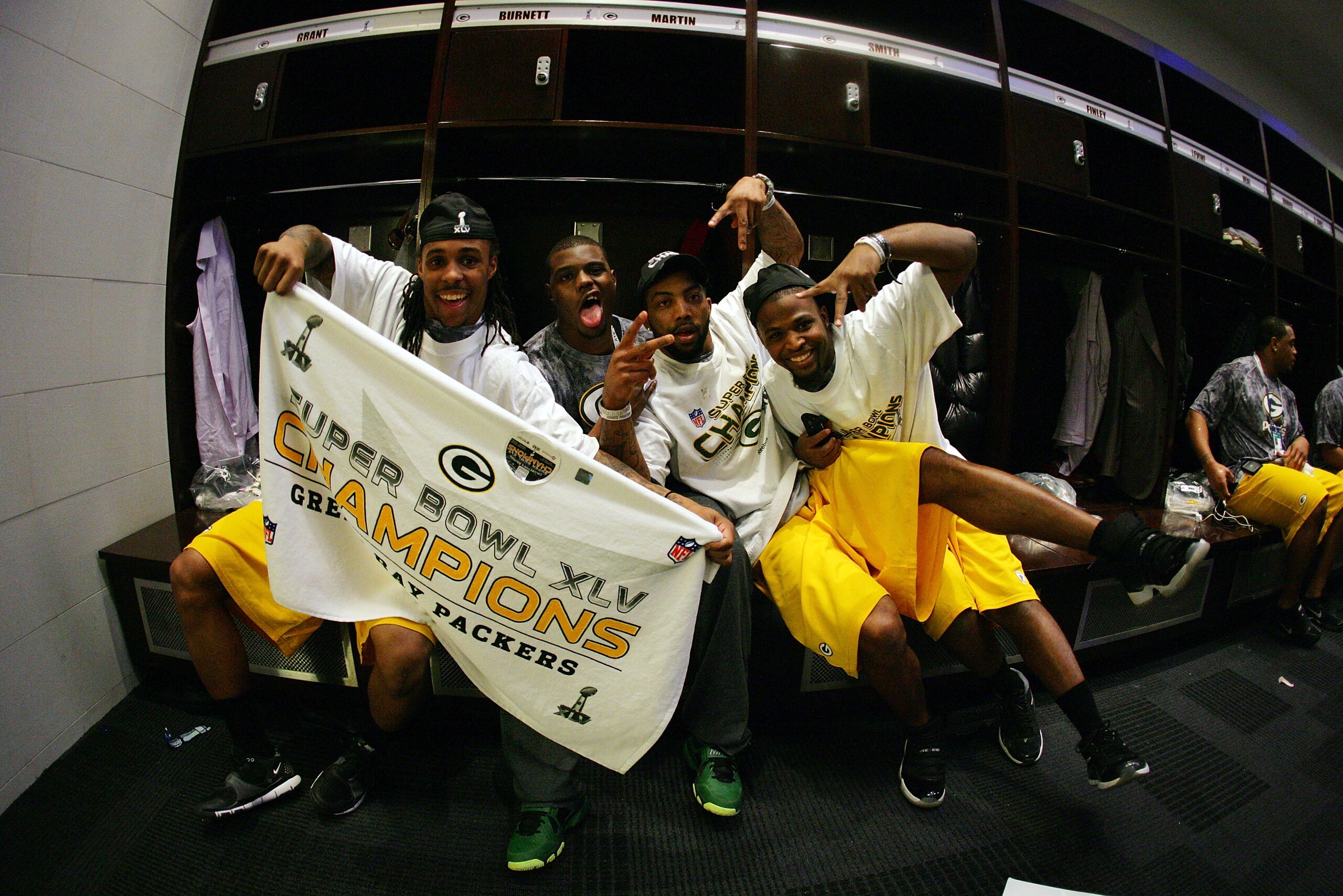 ARLINGTON, TX - FEBRUARY 06:  The Green Bay Packers celebrate in the locker room after winning Super Bowl XLV 31-25 against the Pittsburgh Steelers at Cowboys Stadium on February 6, 2011 in Arlington, Texas.  (Photo by Al Bello/Getty Images)