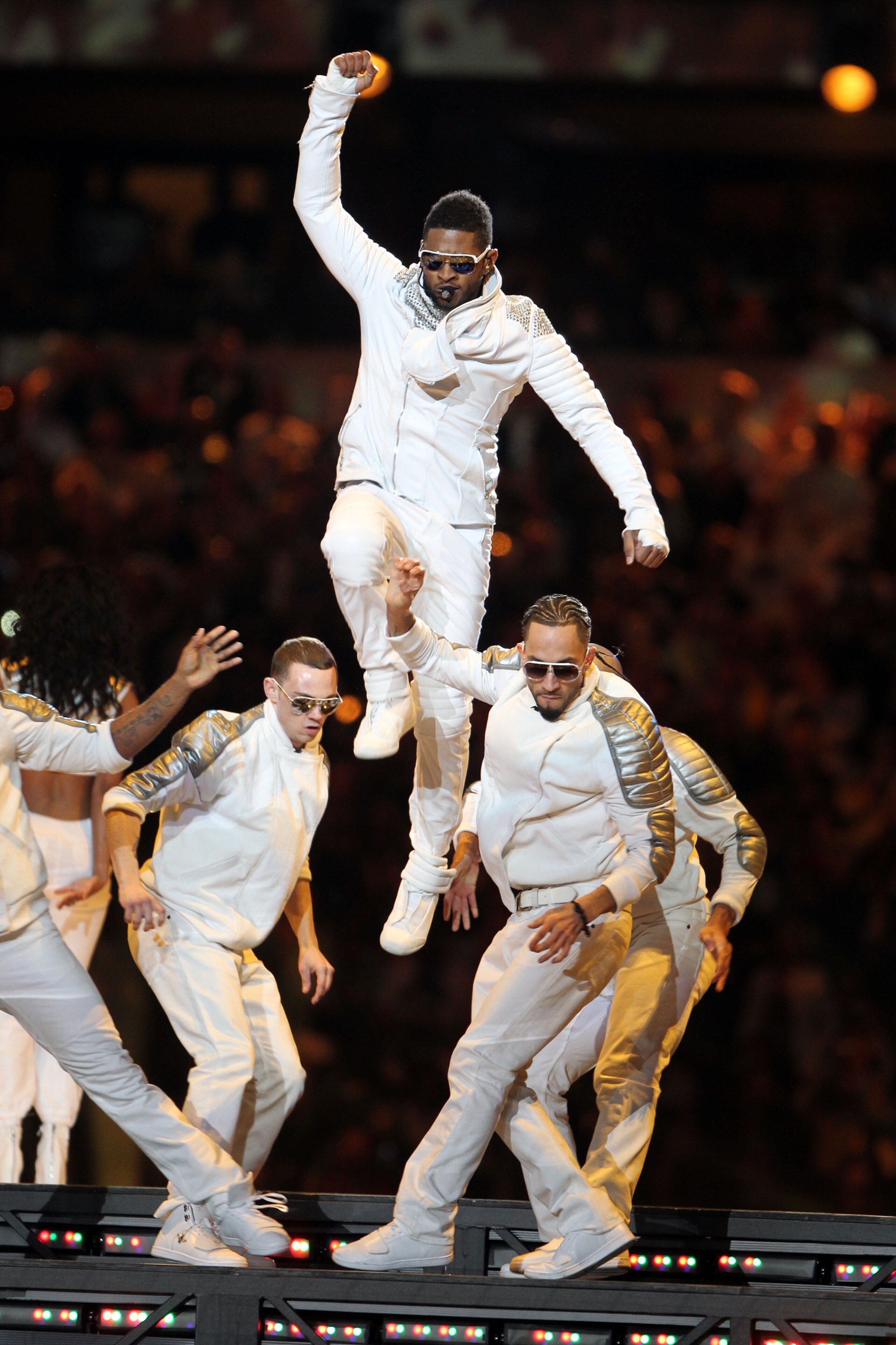 ARLINGTON, TX - FEBRUARY 06:  Usher performs during the Bridgestone Super Bowl XLV Halftime Show at Dallas Cowboys Stadium on February 6, 2011 in Arlington, Texas.  (Photo by Christopher Polk/Getty Images)