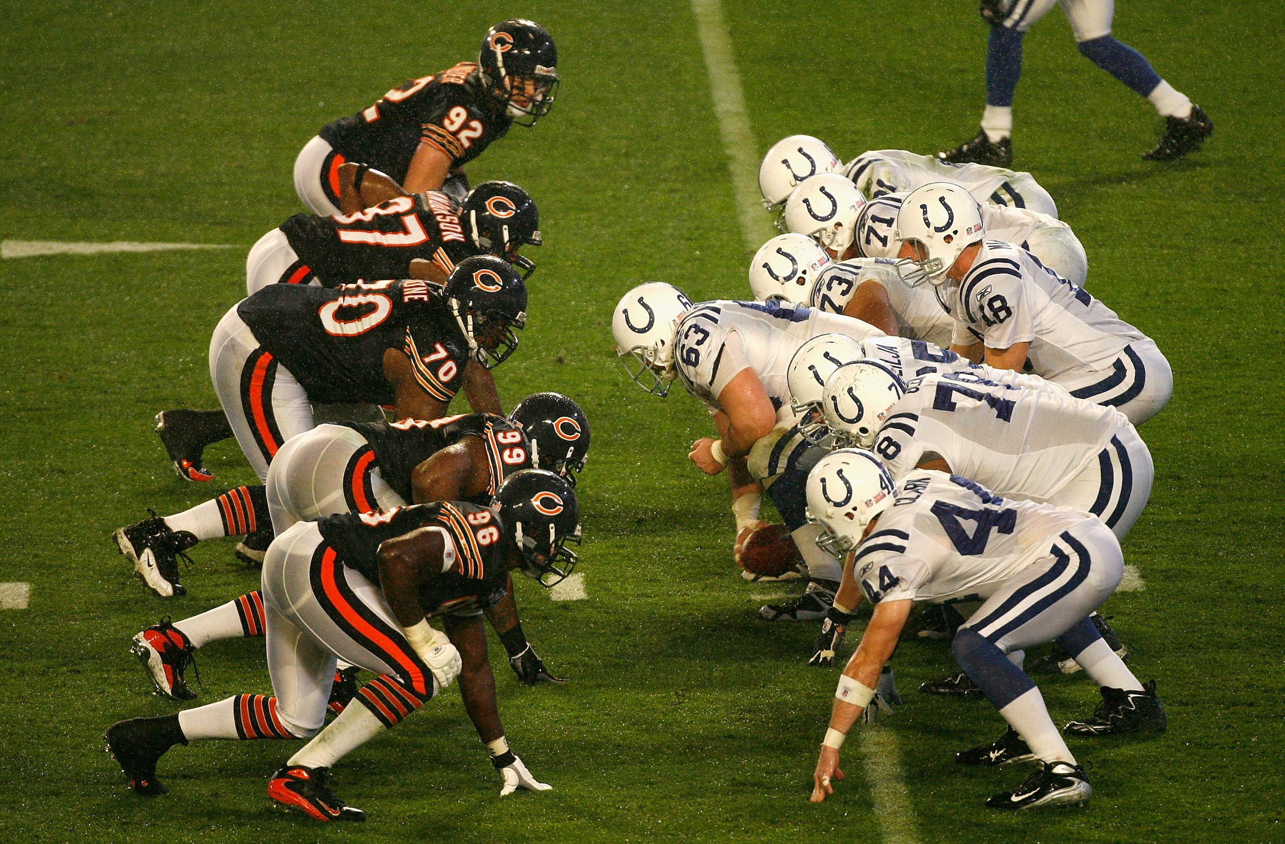 MIAMI GARDENS, FL - FEBRUARY 04:  Quarterback Peyton Manning #18 of the Indianapolis Colts prepares to snap the ball against the Chicago Bears during Super Bowl XLI on February 4, 2007 at Dolphin Stadium in Miami Gardens, Florida. The Colts won 29-17.  (P