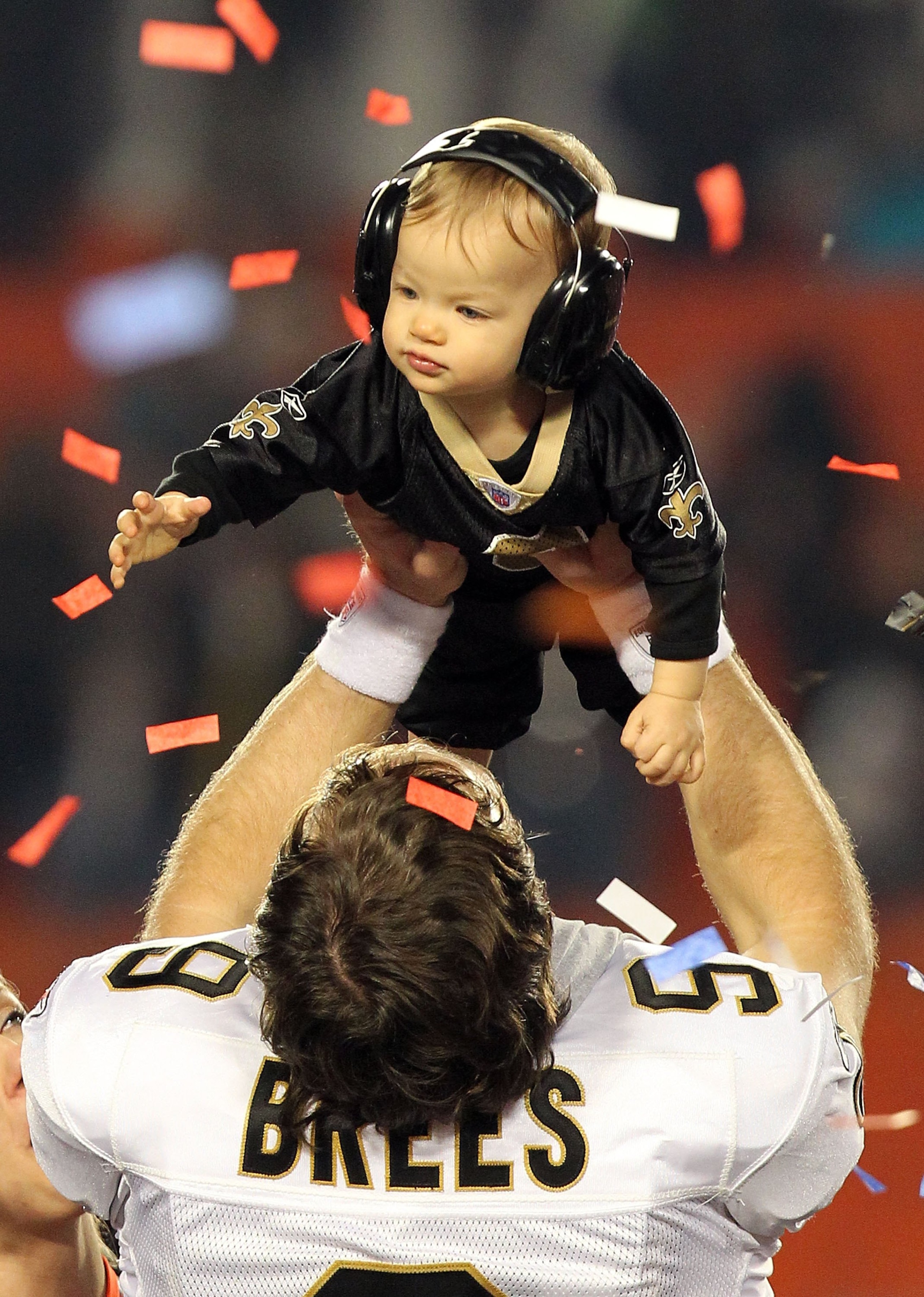 MIAMI GARDENS, FL - FEBRUARY 07:  Drew Brees #9 of the New Orleans Saints celebrates with his son Baylen Brees after defeating the Indianapolis Colts during Super Bowl XLIV on February 7, 2010 at Sun Life Stadium in Miami Gardens, Florida.  (Photo by Rona