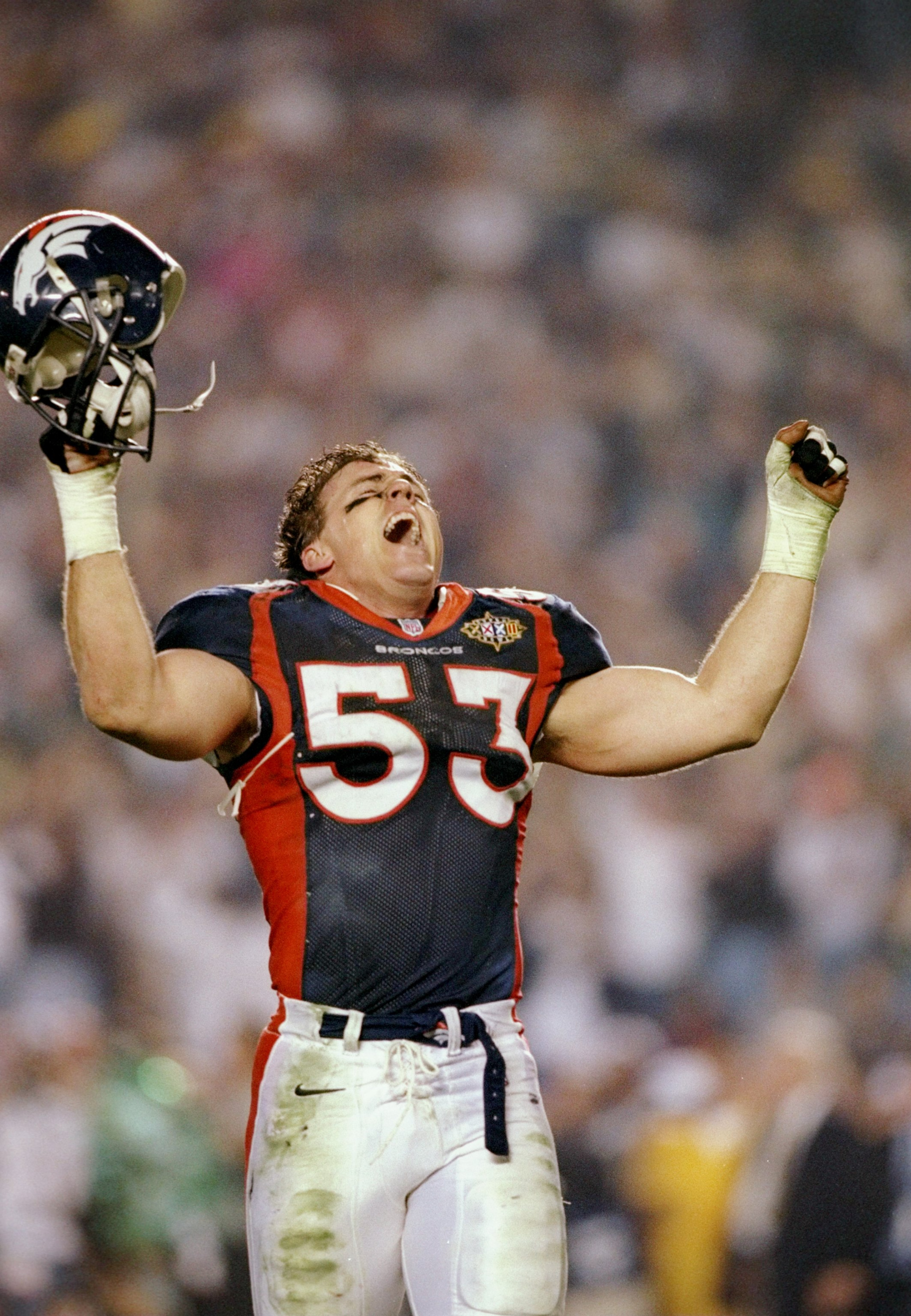 25 Jan 1998:  Bill Romanowski #53 of the Denver Broncos celebrates against the Green Bay Packers during Super Bowl  XXXII at Qualcomm Stadium in San Diego, California.  The Denver Broncos defeated the Green Bay Packers 31-24. Mandatory Credit: Andy Lyons