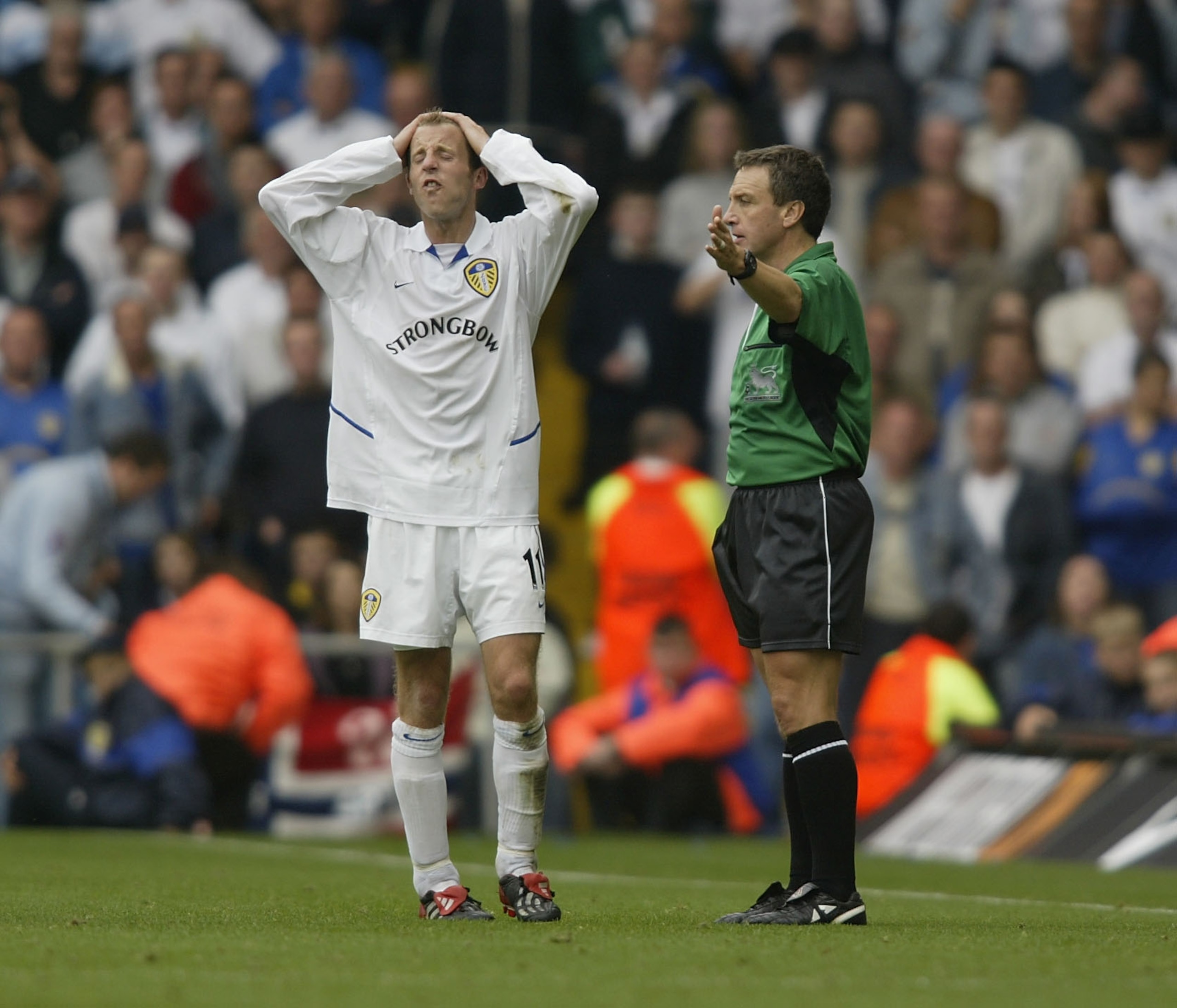 LEEDS - SEPTEMBER 28:  Lee Bowyer of Leeds United pleads with the assisstant referee after fouling Pascal Cynan of Arsenal during the FA Barclaycard Premiership match between Leeds United and Arsenal at Elland Road, Leeds, England on September 28, 2002. (