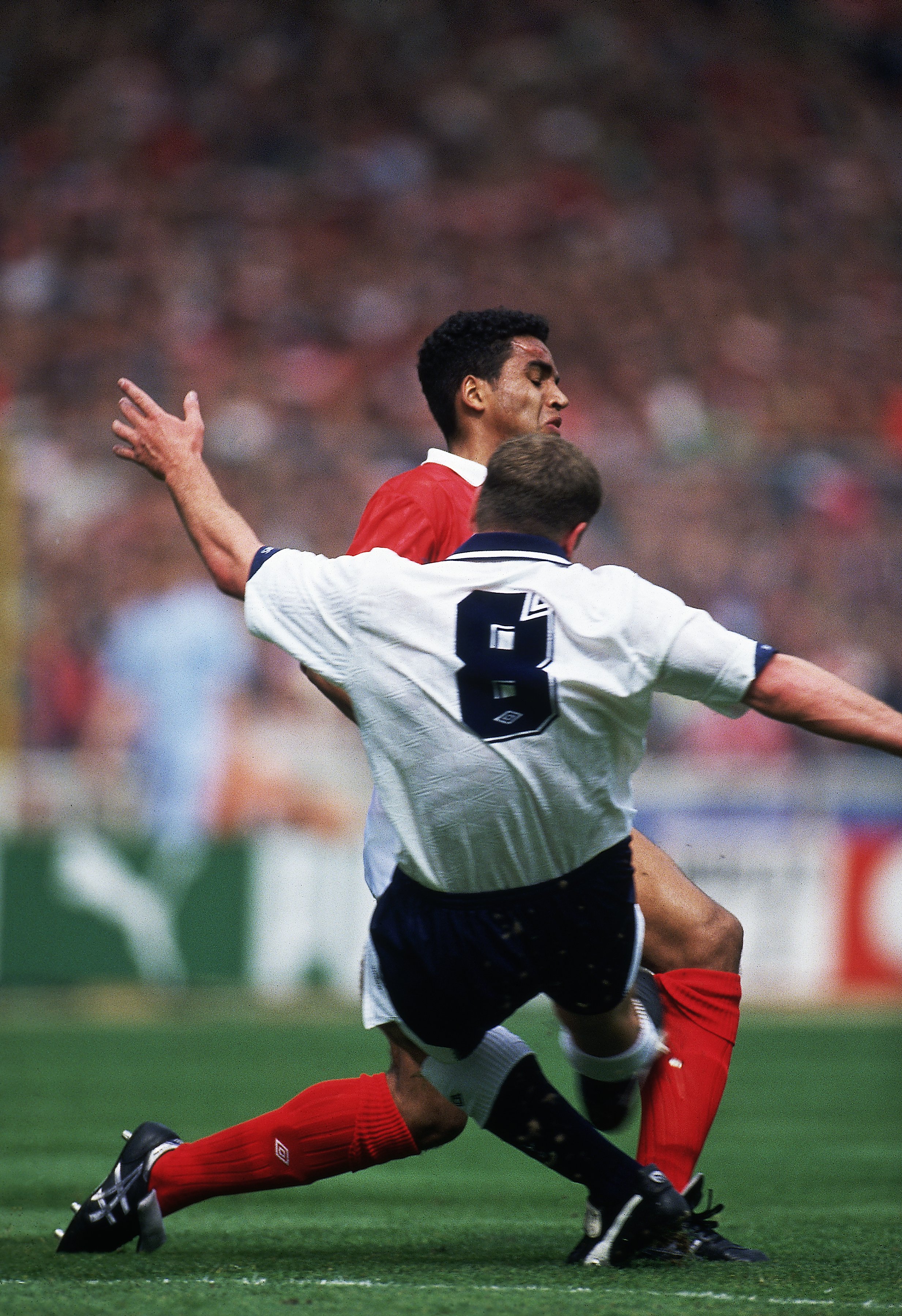 18 May 1991:  Paul Gascoigne of Tottenham Hotspur tackles Gary Charles of Nottingham Forest and comes off worse injuring himself and never really regaining his form from making this challenge during the FA Cup Final played at Wembley Stadium, in London.To