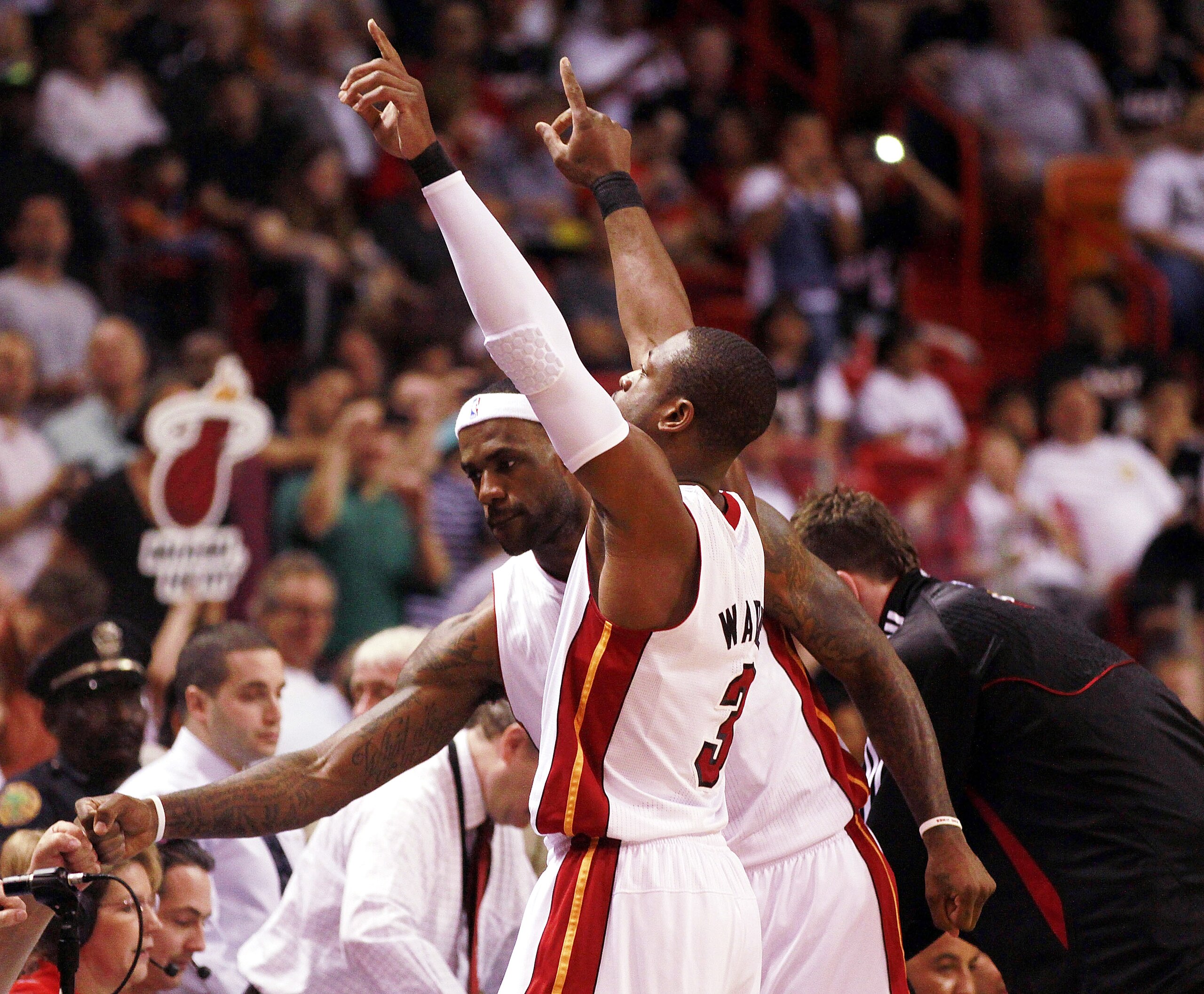 MIAMI - FEBRUARY 06:  Forward LeBron James #6 and Guard Dwyane Wade #3 of the Miami Heat is introduced against the L.A. Clippers at American Airlines Arena on February 6, 2011 in Miami, Florida. The Heat defeated the Clippers 97-79. NOTE TO USER: User exp