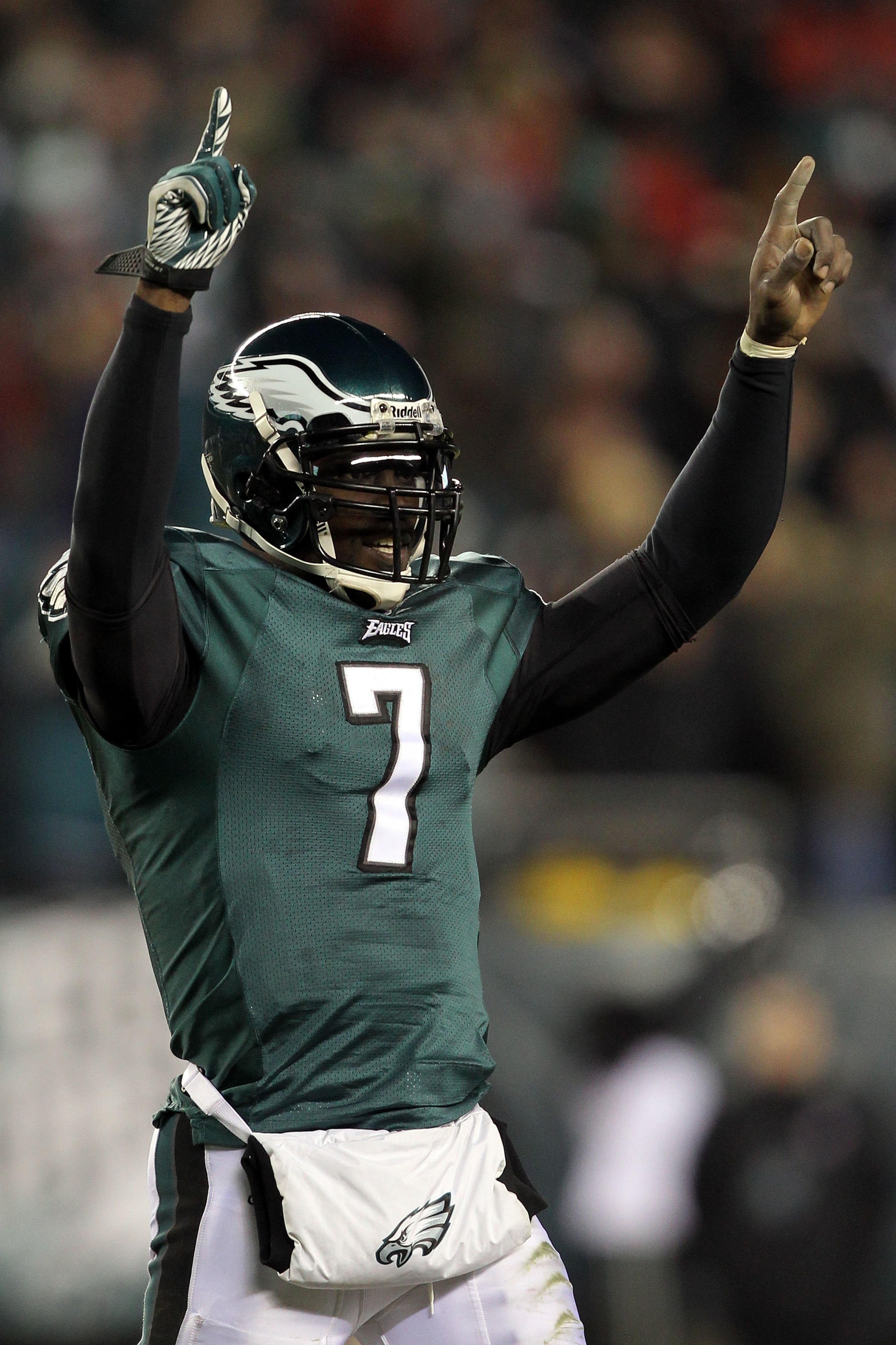 PHILADELPHIA, PA - JANUARY 09:  Michael Vick #7 of the Philadelphia Eagles reacts after a touchdown in the thrid quarter against the Green Bay Packers during the 2011 NFC wild card playoff game at Lincoln Financial Field on January 9, 2011 in Philadelphia