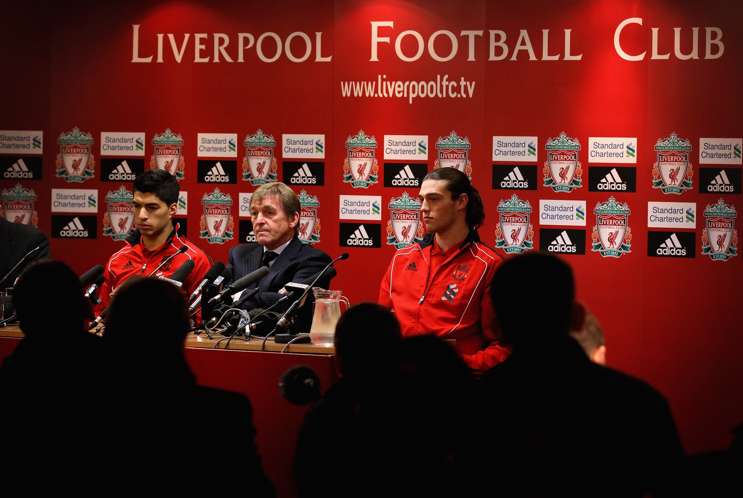 LIVERPOOL, ENGLAND - FEBRUARY 03: Kenny Dalglish the manager of Liverpool sits between his new signings, Luis Suarez (l) and Andy Carroll (r) as they face the media during a press conference at Anfield on February 3, 2011 in Liverpool, England. (Photo b LIVERPOOL, ENGLAND - FEBRUARY 03: Kenny Dalglish the manager of Liverpool sits between his new signings, Luis Suarez (l) and Andy Carroll (r) as they face the media during a press conference at Anfield on February 3, 2011 in Liverpool, England. (Photo b