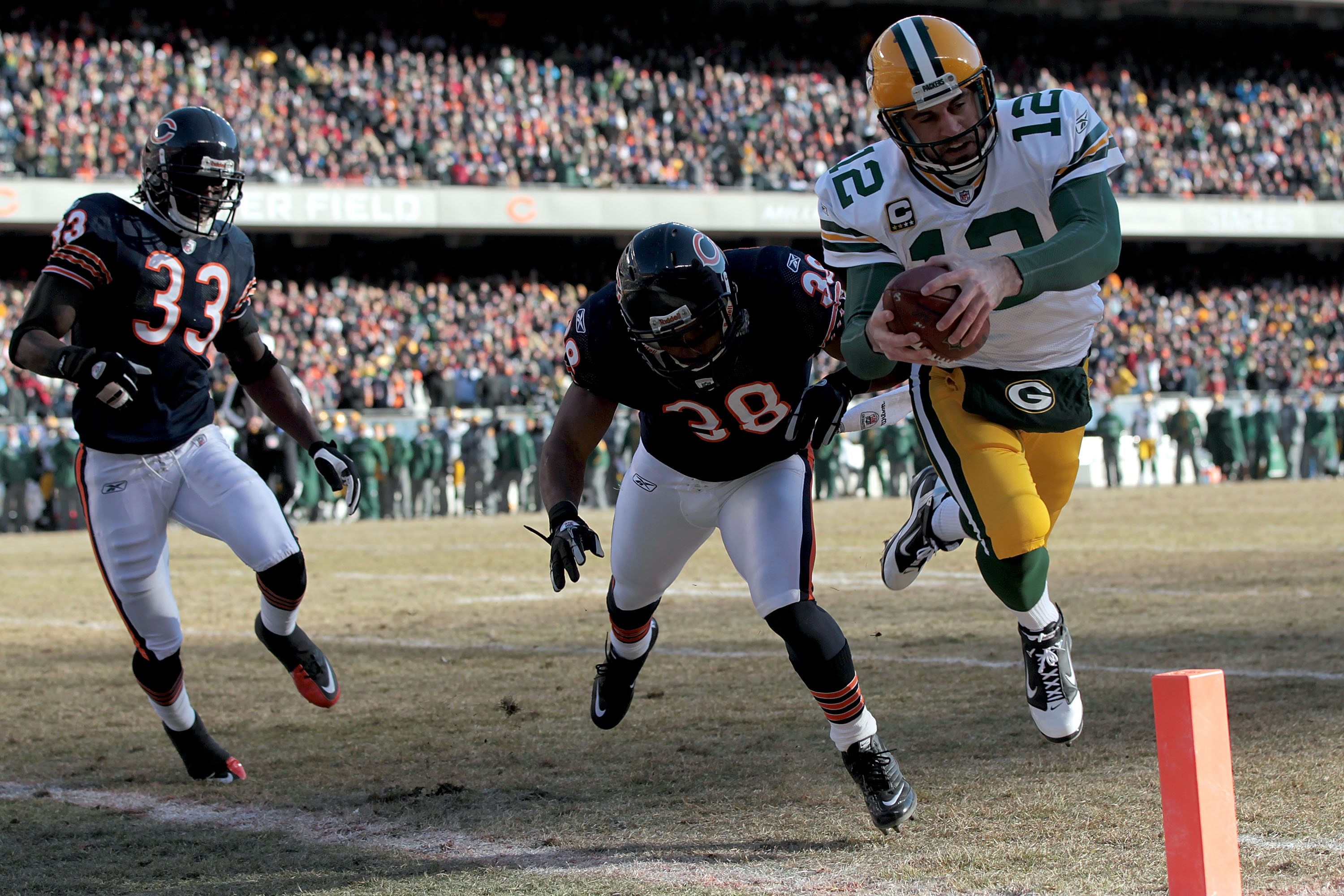 Green Bay Packers receiver Jordy Nelson (87) and quarterback Aaron Rodgers  (12) are all smiles after the two teamed up for a touchdown against the  Chicago Bears in the fourth quarter at