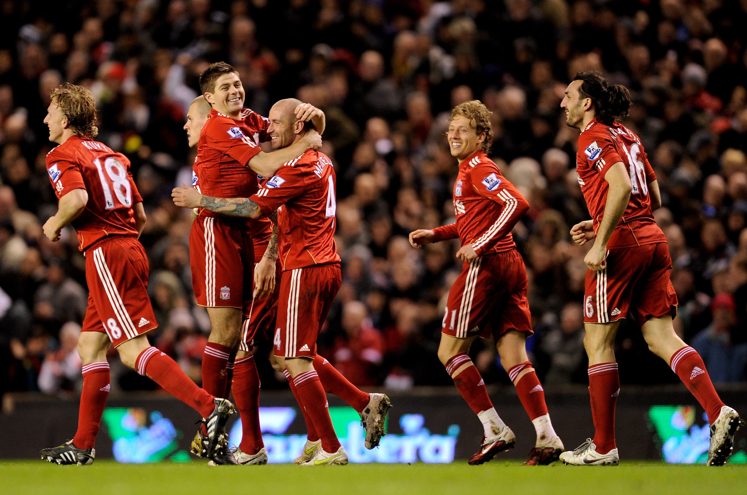 LIVERPOOL, ENGLAND - FEBRUARY 02: Raul Meireles of Liverpool celebrates with his team mates after scoring the opening goal during the Barclays Premier League match between Liverpool and Stoke City at Anfield on February 2, 2011 in Liverpool, England. (P LIVERPOOL, ENGLAND - FEBRUARY 02: Raul Meireles of Liverpool celebrates with his team mates after scoring the opening goal during the Barclays Premier League match between Liverpool and Stoke City at Anfield on February 2, 2011 in Liverpool, England. (P