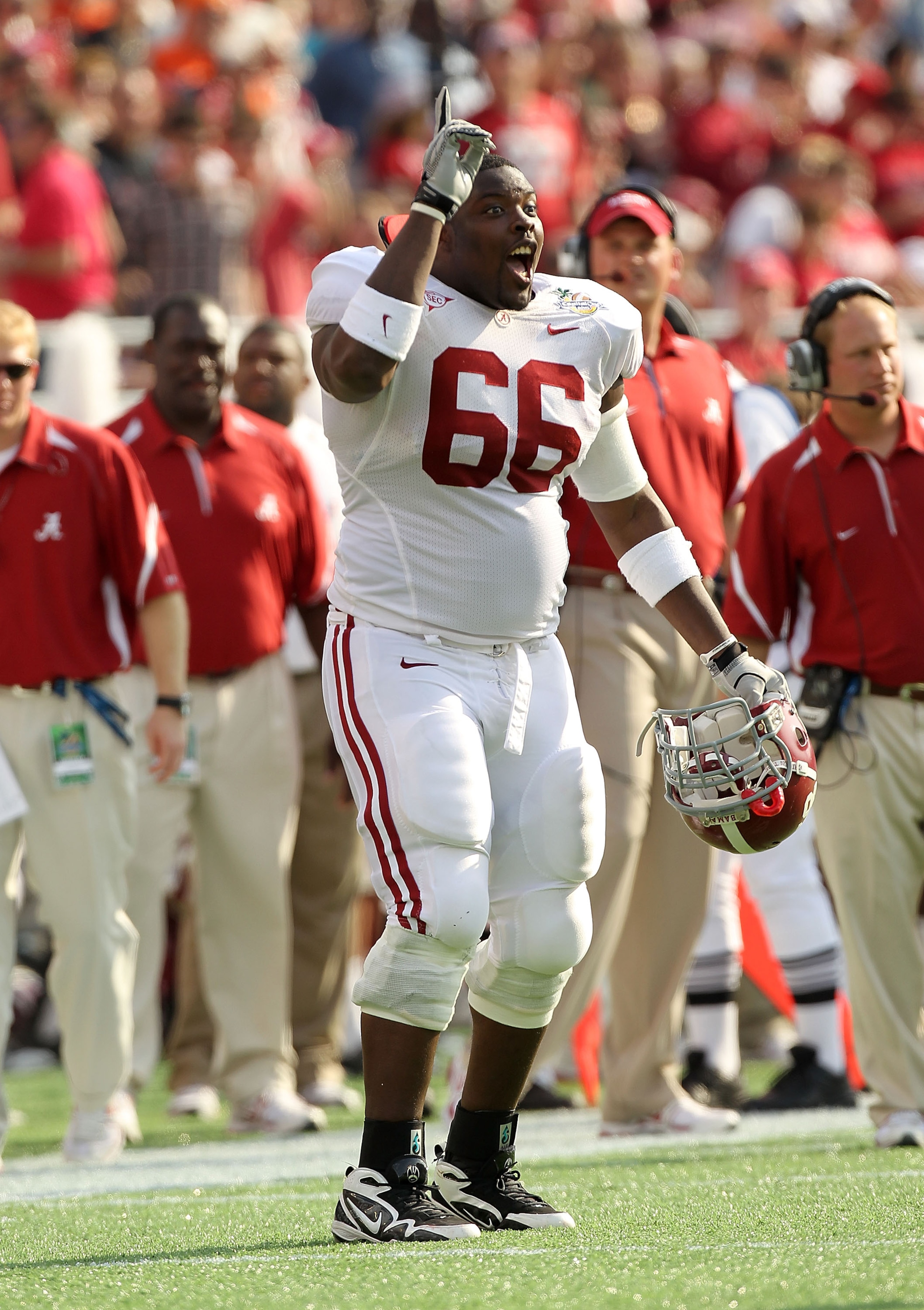 ORLANDO, FL - JANUARY 01: Brian Motley #66 of the Alabama Crimson Tide celebrates after a touchdown during the Capitol One Bowl against the Michigan State Spartans at the Florida Citrus Bowl on January 1, 2011 in Orlando, Florida.  (Photo by Mike Ehrmann/