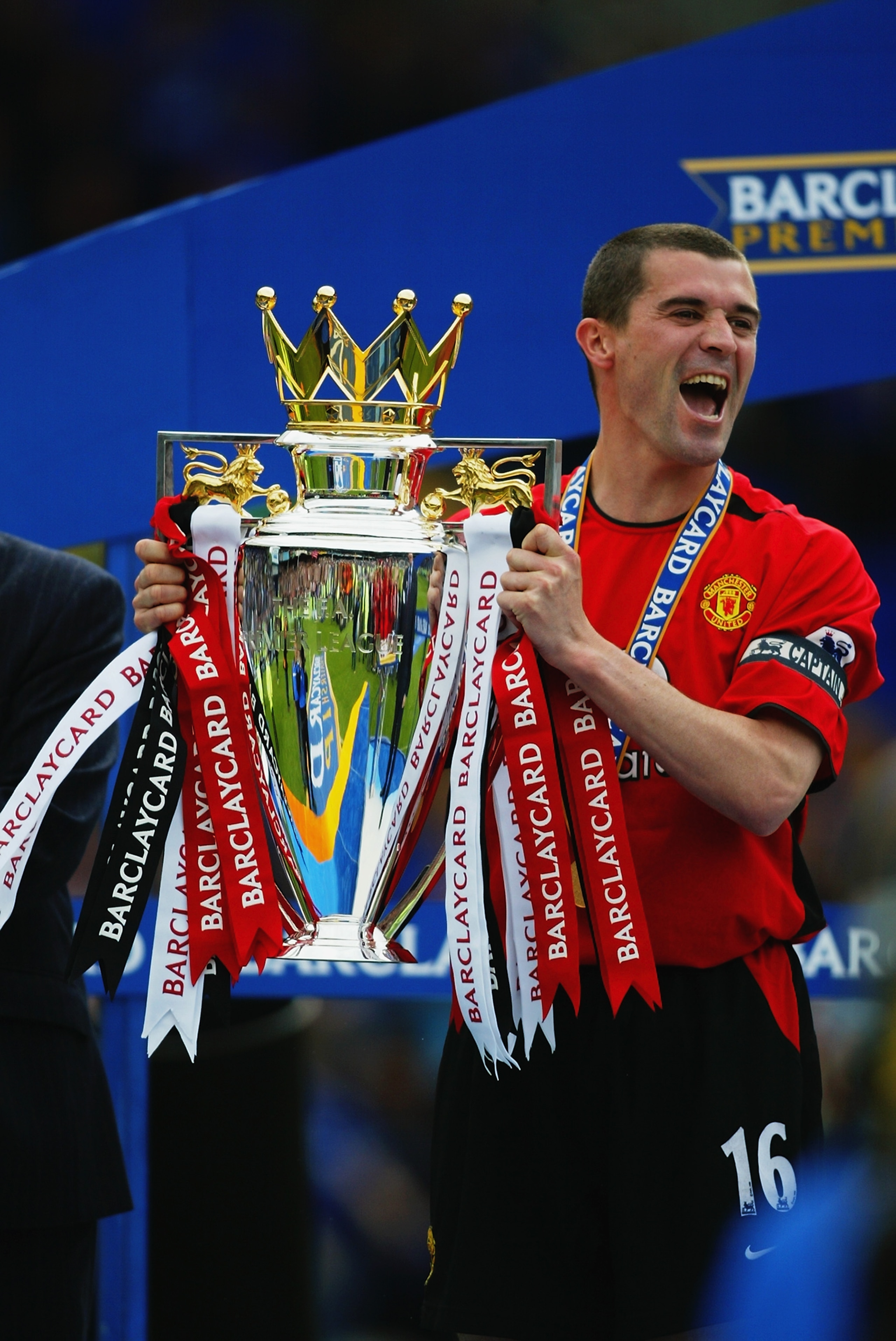LIVERPOOL - MAY 11:  Roy Keane of Manchester United lifts the trophy up after the FA Barclaycard Premiership match between Everton and Manchester United held on May 11, 2003 at Goodison Park, in Liverpool, England. Manchester United won the match 2-1. (Ph