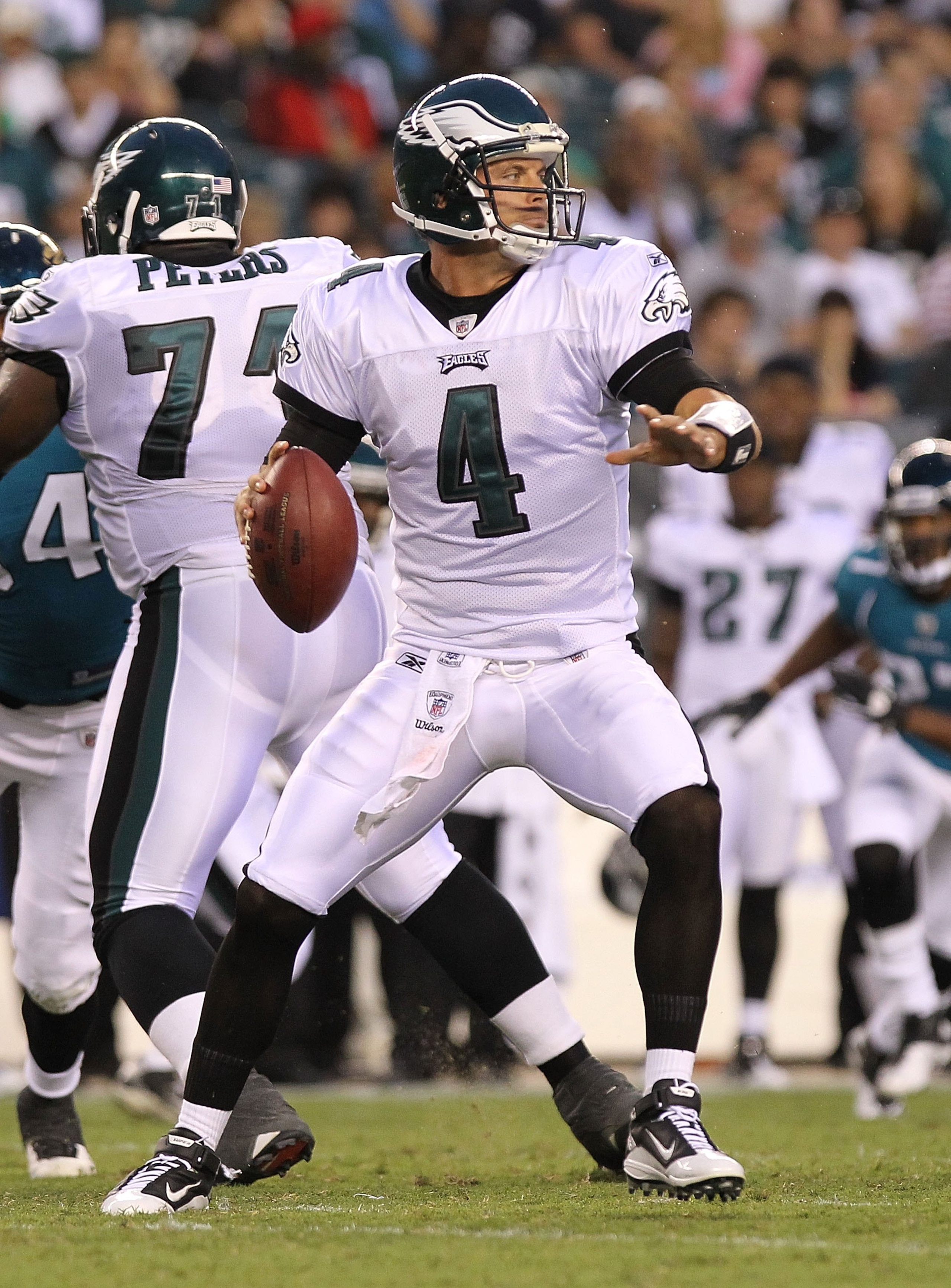 PHILADELPHIA - AUGUST 13: Kevin Kolb #4 of the Philadelphia Eagles drops back to pass against the Jacksonville Jaguars during their preseason game at Lincoln Financial Field on August 13, 2010 in Philadelphia, Pennsylvania. (Photo by Nick Laham/Getty Im PHILADELPHIA - AUGUST 13: Kevin Kolb #4 of the Philadelphia Eagles drops back to pass against the Jacksonville Jaguars during their preseason game at Lincoln Financial Field on August 13, 2010 in Philadelphia, Pennsylvania. (Photo by Nick Laham/Getty Im