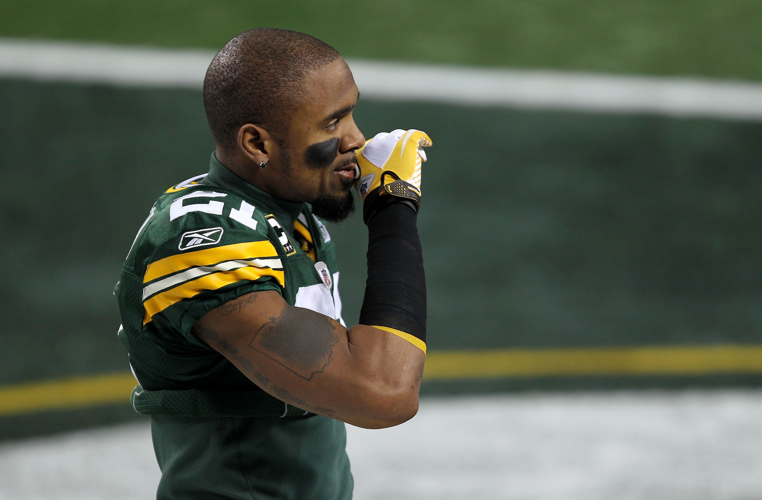 ARLINGTON, TX - FEBRUARY 06: Charles Woodson #21 of the Green Bay Packers walks on the field prior to Super Bowl XLV at Cowboys Stadium on February 6, 2011 in Arlington, Texas.  (Photo by Mike Ehrmann/Getty Images)