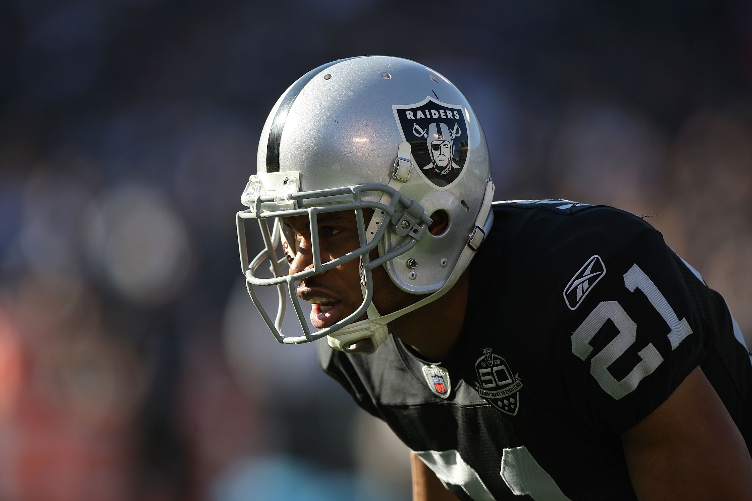 OAKLAND, CA - JANUARY 03:  Nnamdi Asomugha #21 of the Oakland Raiders in action against the Baltimore Ravens during an NFL game at Oakland-Alameda County Coliseum on January 3, 2010 in Oakland, California.  (Photo by Jed Jacobsohn/Getty Images)