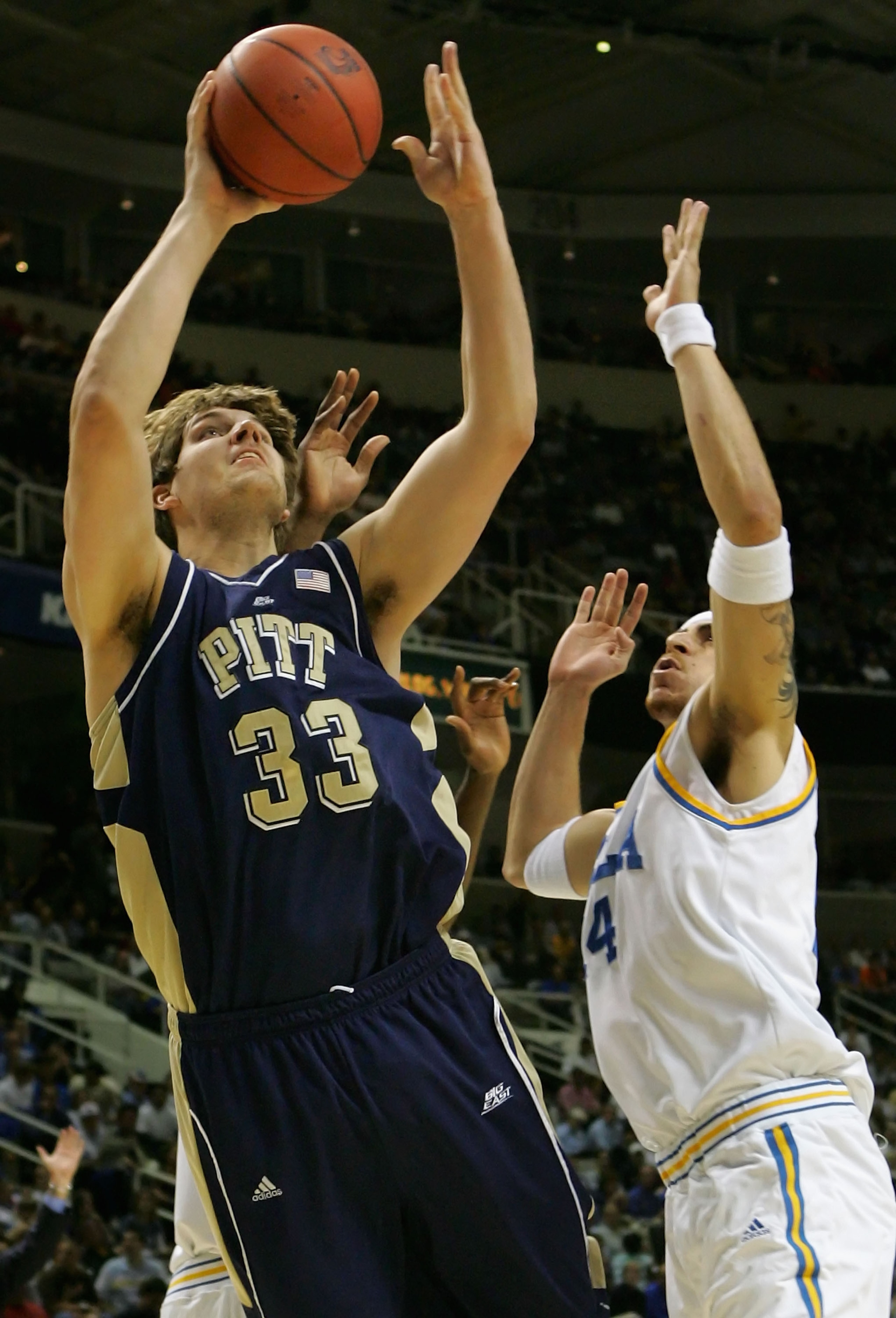 SAN JOSE, CA - MARCH 22:  Aaron Gray #33 of the Pittsburgh Panthers puts up a shot past Lorenzo Mata #14 of the UCLA Bruins during round three of the NCAA Men's Basketball Tournament at the HP Pavilion on March 22, 2007 in San Jose, California.  (Photo by