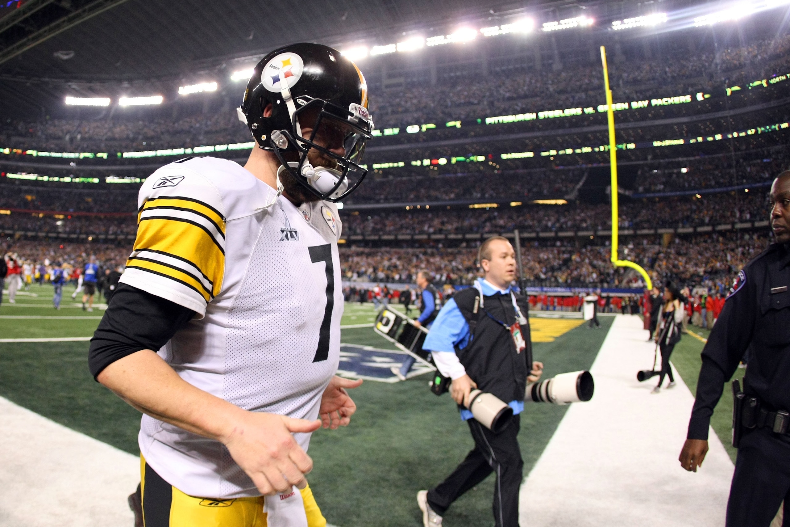 ARLINGTON, TX - FEBRUARY 06:  Ben Roethlisberger #7 of the Pittsburgh Steelers walks off the field after losing to the Green Bay Packers during Super Bowl XLV at Cowboys Stadium on February 6, 2011 in Arlington, Texas.  (Photo by Doug Pensinger/Getty Imag