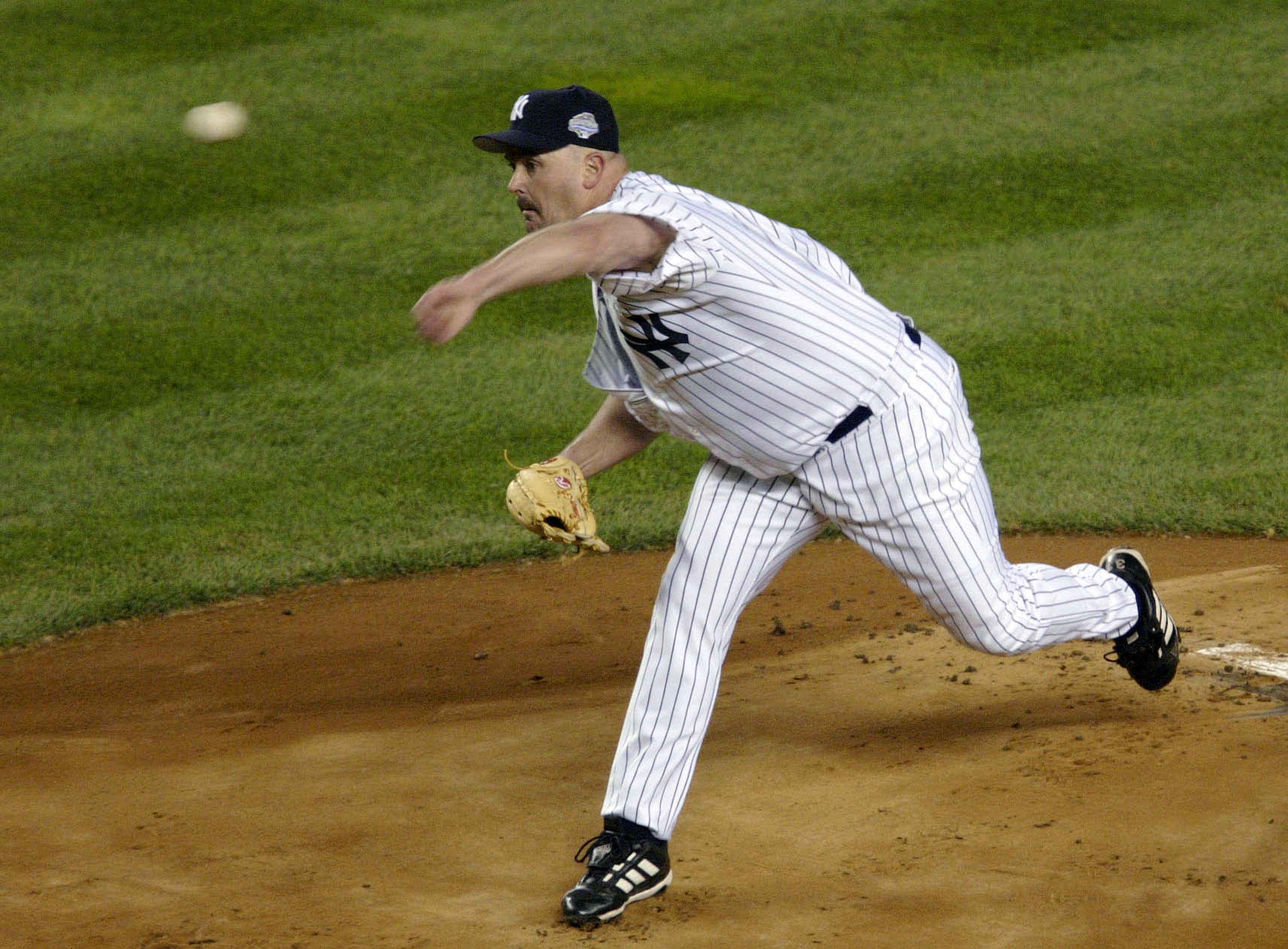BRONX, NY - OCTOBER 18:  Starting pitcher David Wells #33 of the New York Yankees throws against the Florida Marlins in the first inning during game one of the Major League Baseball World Series October 18, 2003 at Yankee Stadium in the Bronx, New York.