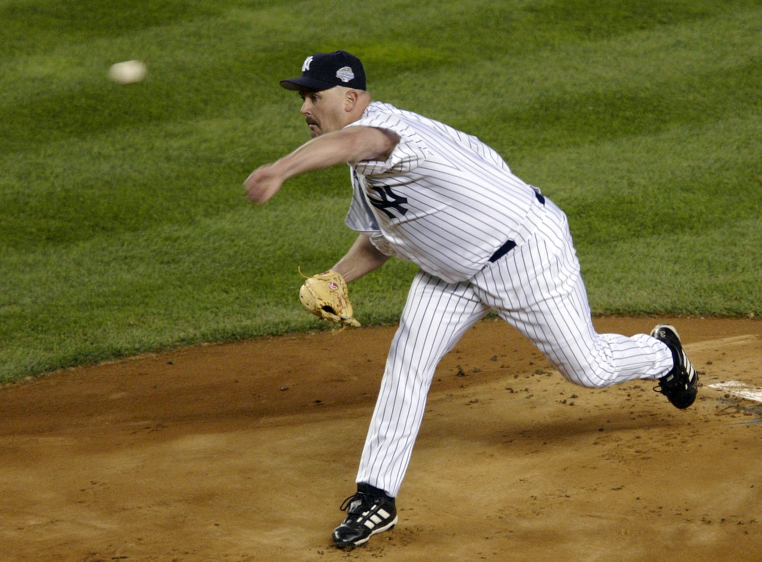 BRONX, NY - OCTOBER 18: Starting pitcher David Wells #33 of the New York Yankees throws against the Florida Marlins in the first inning during game one of the Major League Baseball World Series October 18, 2003 at Yankee Stadium in the Bronx, New York. BRONX, NY - OCTOBER 18: Starting pitcher David Wells #33 of the New York Yankees throws against the Florida Marlins in the first inning during game one of the Major League Baseball World Series October 18, 2003 at Yankee Stadium in the Bronx, New York.