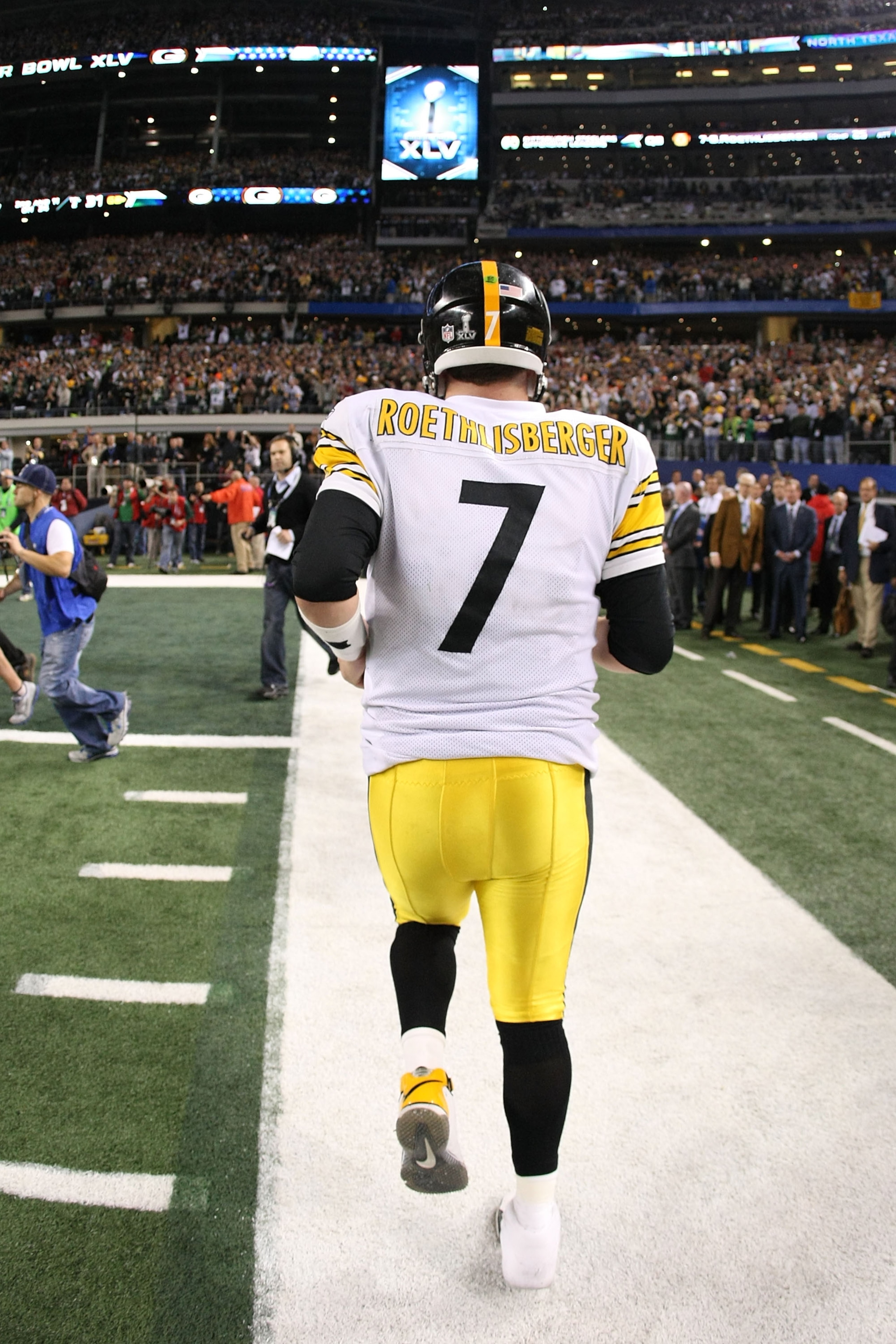 ARLINGTON, TX - FEBRUARY 06:  Ben Roethlisberger #7 of the Pittsburgh Steelers walks off the field after losing to the Green Bay Packers during Super Bowl XLV at Cowboys Stadium on February 6, 2011 in Arlington, Texas.  (Photo by Doug Pensinger/Getty Imag