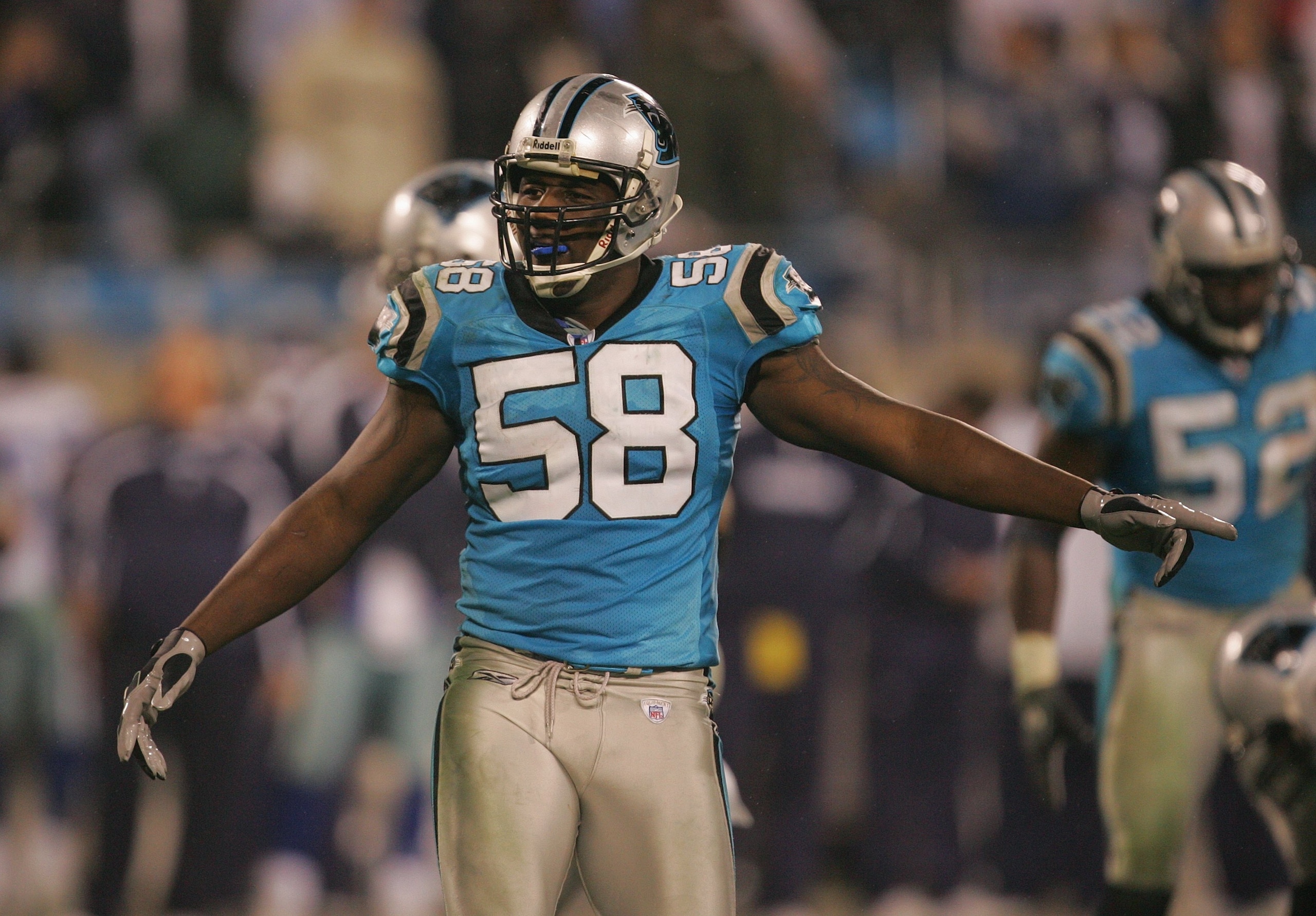 CHARLOTTE, NC - DECEMBER 22:  Thomas Davis #58 of the Carolina Panthers reacts after a play against the Dallas Cowboys during their game at Bank of America Stadium on December 22, 2007 in Charlotte, North Carolina. (Photo by Streeter Lecka/Getty Images)