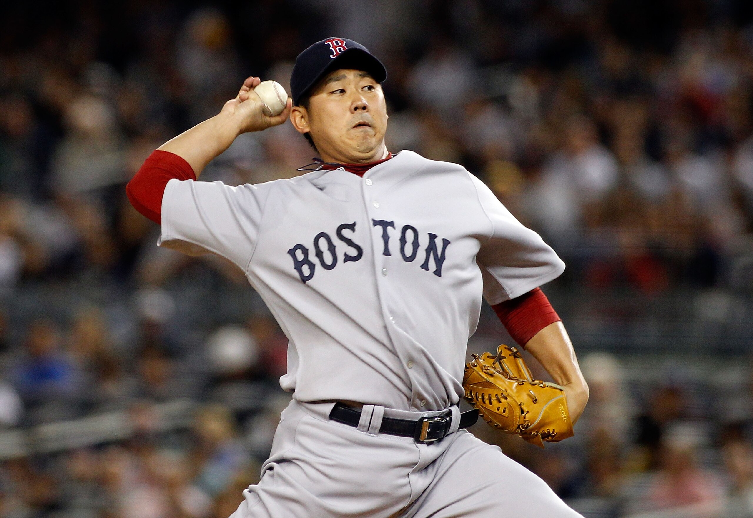 NEW YORK - SEPTEMBER 26:  Daisuke Matsuzaka #18 of the Boston Red Sox delivers a pitch in the first-inning against the New York Yankees on September 26, 2010 at Yankee Stadium in the Bronx borough of New York City.  (Photo by Mike Stobe/Getty Images)