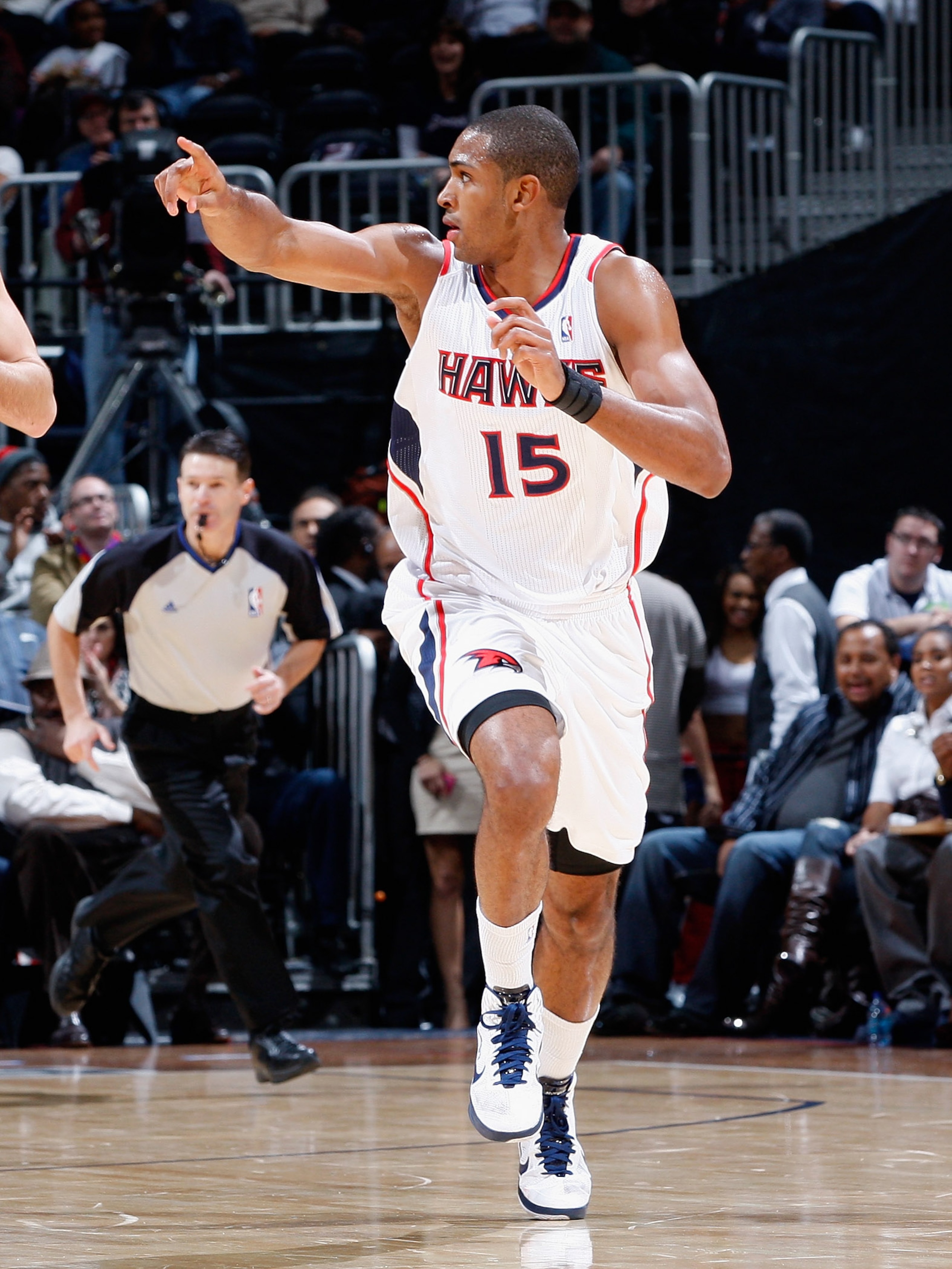 ATLANTA, GA - DECEMBER 11:  Al Horford #15 of the Atlanta Hawks against the Indiana Pacers at Philips Arena on December 11, 2010 in Atlanta, Georgia.  NOTE TO USER: User expressly acknowledges and agrees that, by downloading and/or using this Photograph,