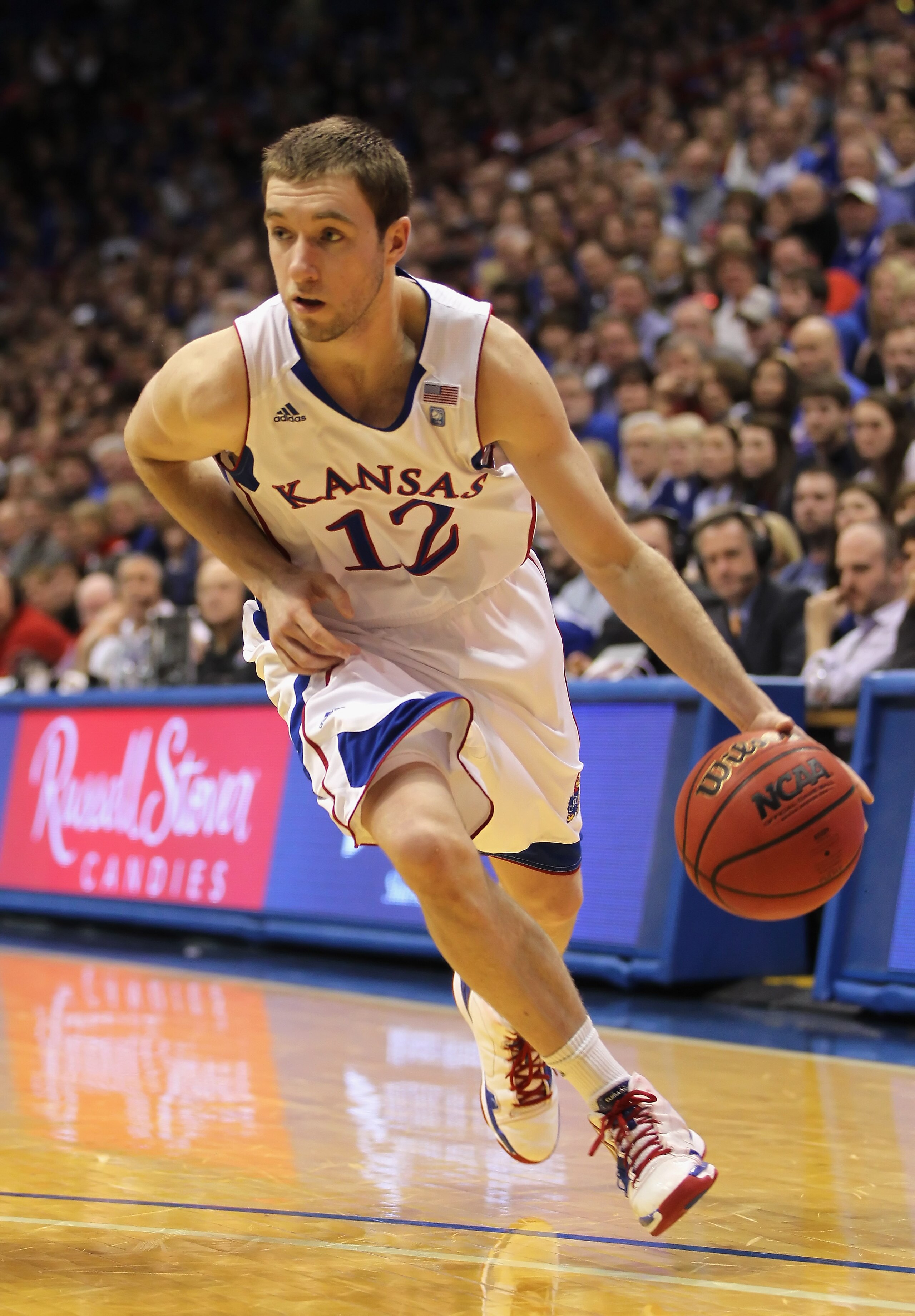 LAWRENCE, KS - DECEMBER 29: Brady Morningstar #12 of the Kansas Jayhawks in action during the game against the University of Texas Arlington Mavericks on December 29, 2010 at Allen Fieldhouse in Lawrence, Kansas. (Photo by Jamie Squire/Getty Images) LAWRENCE, KS - DECEMBER 29: Brady Morningstar #12 of the Kansas Jayhawks in action during the game against the University of Texas Arlington Mavericks on December 29, 2010 at Allen Fieldhouse in Lawrence, Kansas. (Photo by Jamie Squire/Getty Images)