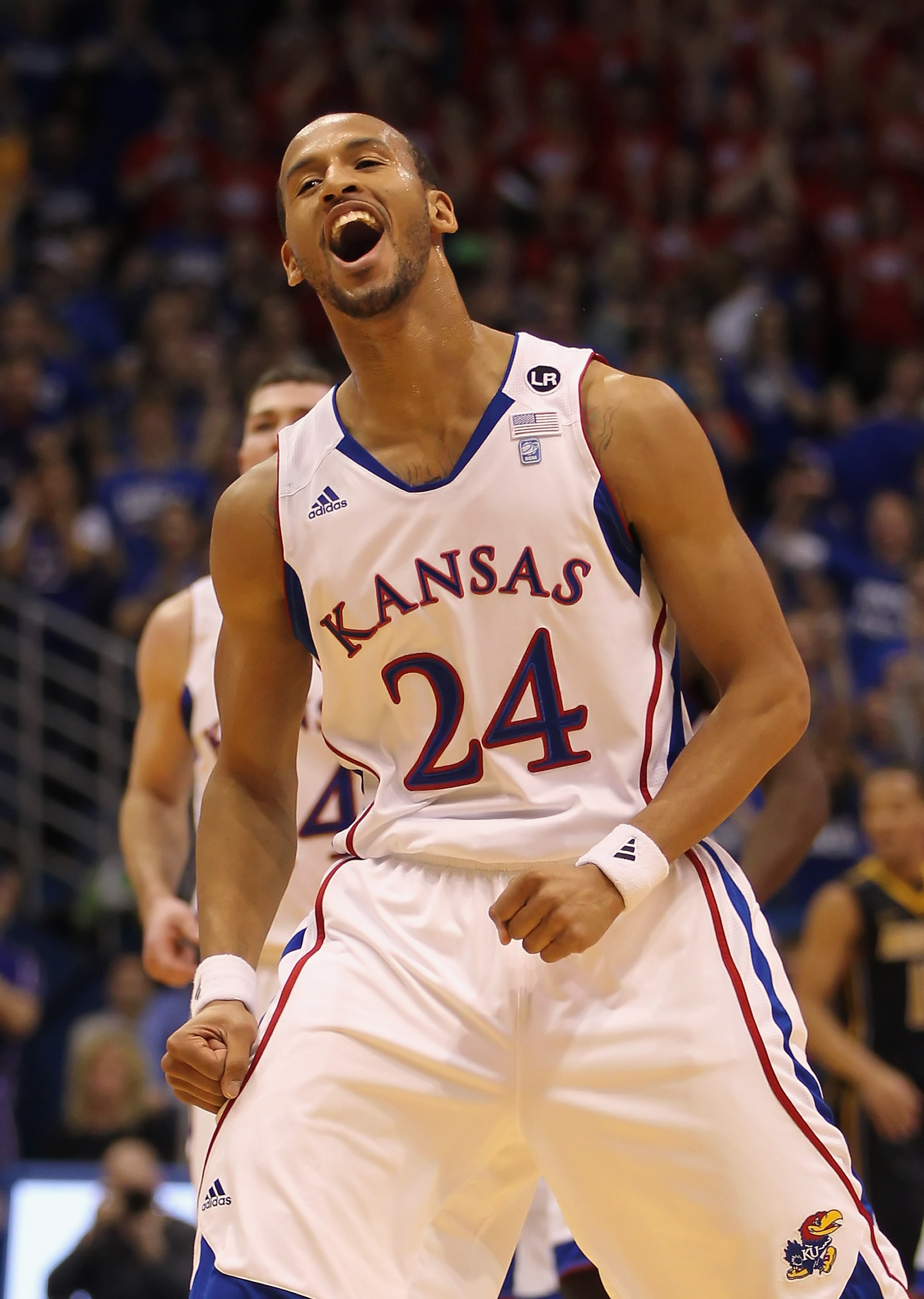 LAWRENCE, KS - FEBRUARY 07: Travis Releford #24 of the Kansas Jayhawks reacts after making a shot during the game against the Missouri Tigers on February 5, 2011 at Allen Fieldhouse in Lawrence, Kansas. (Photo by Jamie Squire/Getty Images) LAWRENCE, KS - FEBRUARY 07: Travis Releford #24 of the Kansas Jayhawks reacts after making a shot during the game against the Missouri Tigers on February 5, 2011 at Allen Fieldhouse in Lawrence, Kansas. (Photo by Jamie Squire/Getty Images)