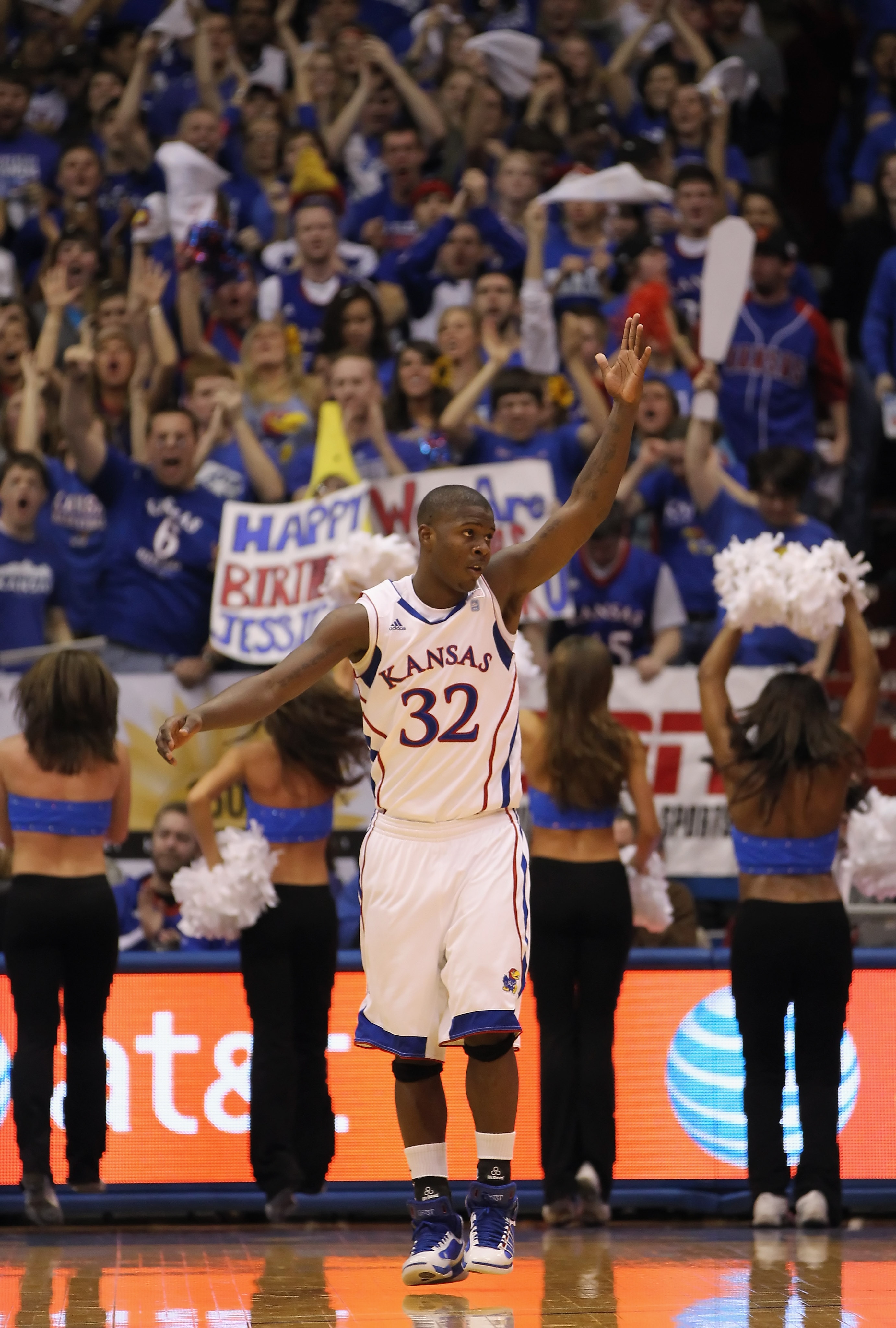 LAWRENCE, KS - JANUARY 29:  Josh Selby #32 of the Kansas Jayhawks waves to the crowd after sinking a three-pointer during the game against the Kansas State Wildcats on January 29, 2011 at Allen Fieldhouse in Lawrence, Kansas.  (Photo by Jamie Squire/Getty
