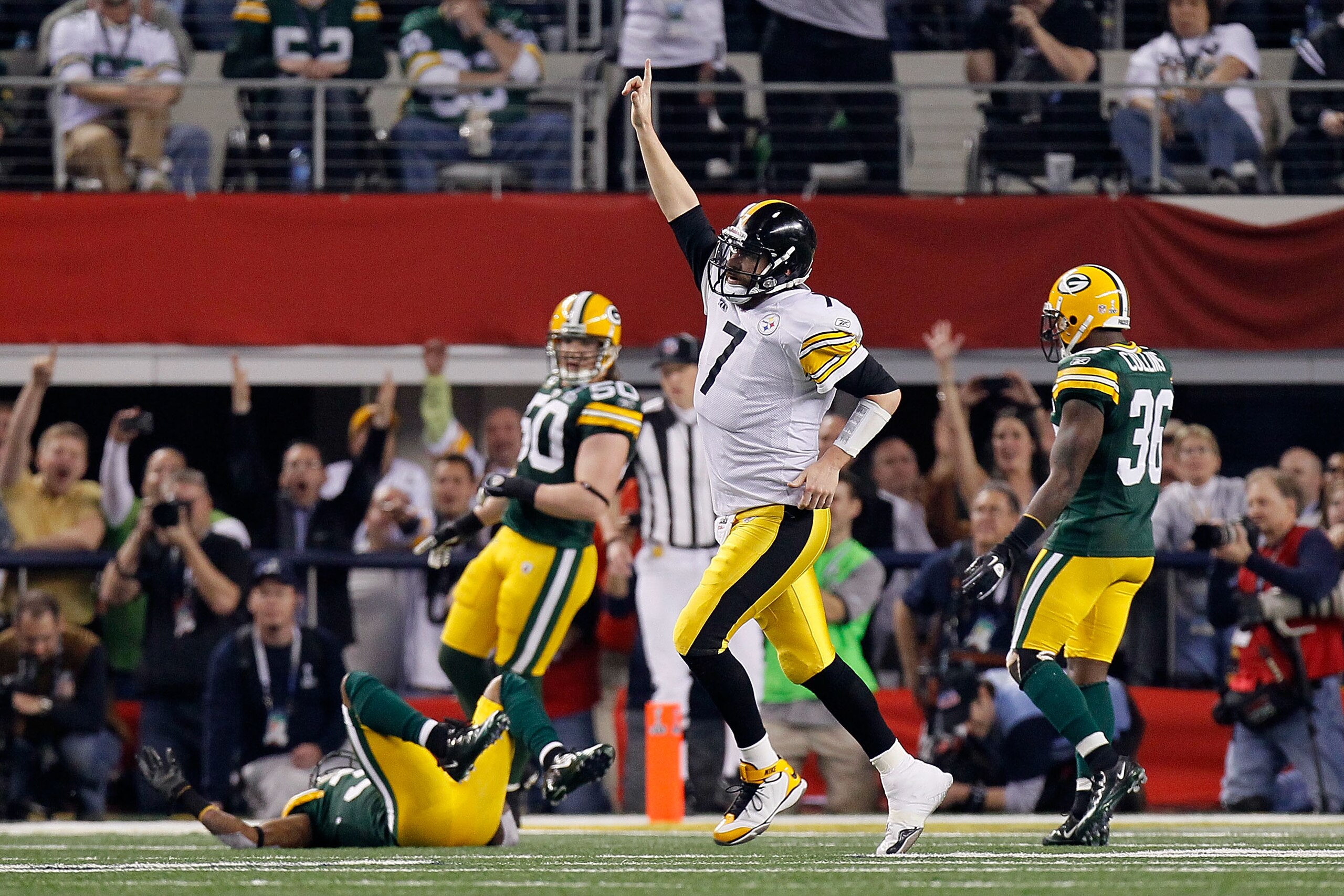 ARLINGTON, TX - FEBRUARY 06: Ben Roethlisberger #7 of the Pittsburgh Steelers celebrates in the fourth quarter agains the Green Bay Packers during Super Bowl XLV at Cowboys Stadium on February 6, 2011 in Arlington, Texas.  (Photo by Kevin C. Cox/Getty Ima