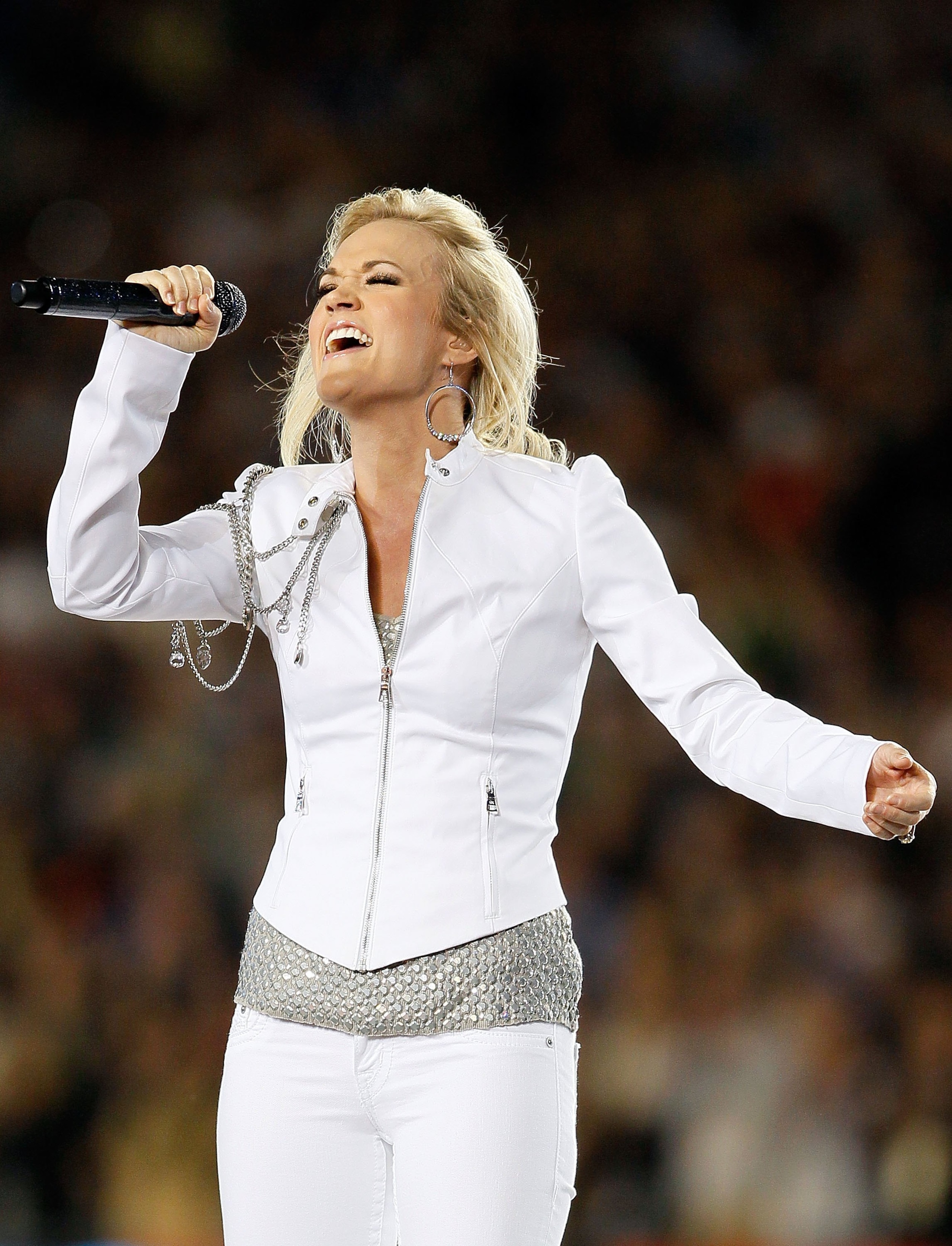 MIAMI GARDENS, FL - FEBRUARY 07:  Singer Carrie Underwood performs during the pregame show prior to Super Bowl XLIV between the Indianapolis Colts and the New Orleans Saints on February 7, 2010 at Sun Life Stadium in Miami Gardens, Florida.  (Photo by And