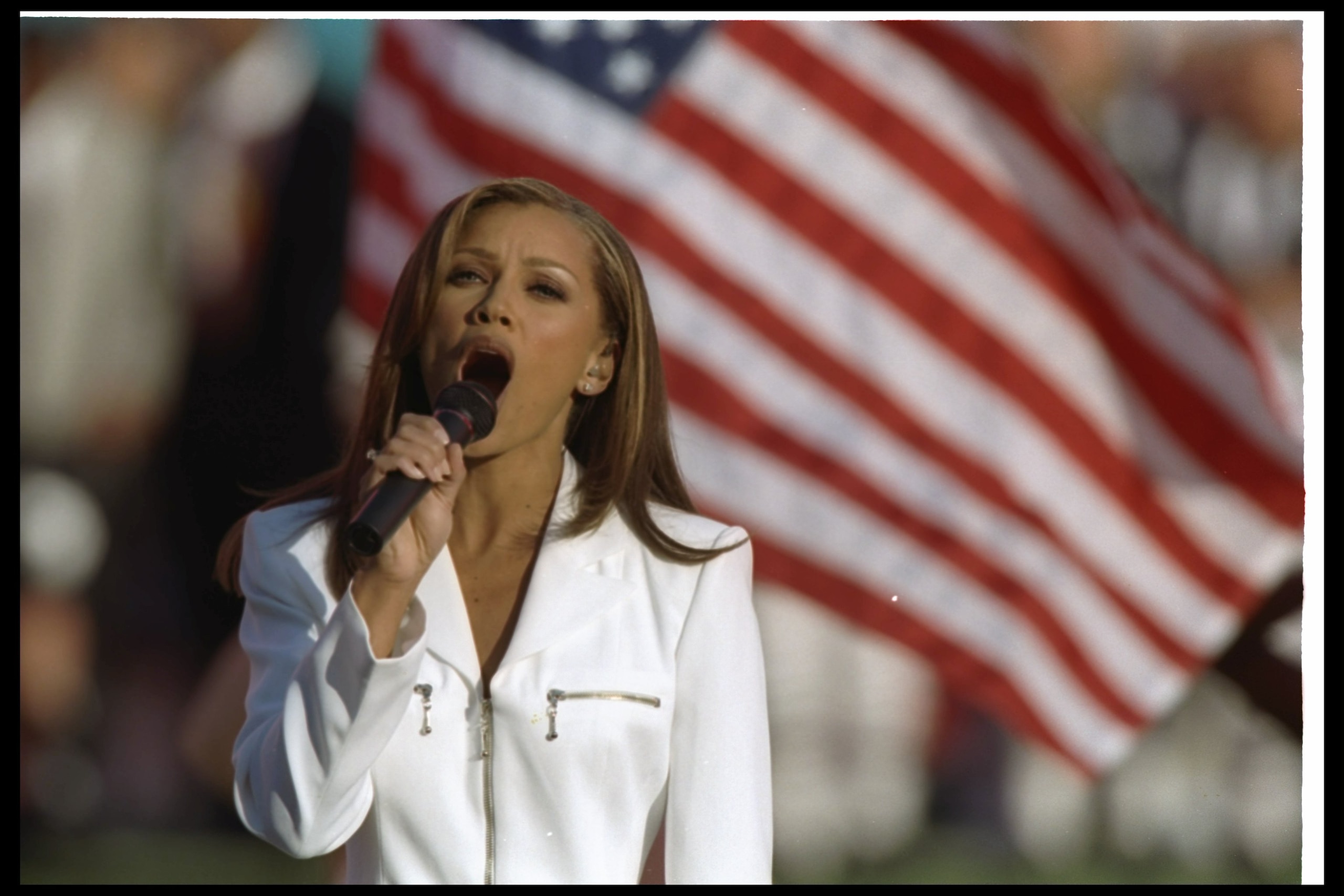 28 Jan 1996:  Vanessa Williams sings the National Anthem for Super Bowl XXX between the Dallas Cowboys and the Pittsburgh Steelers at Sun Devil Stadium in Tempe, Arizona.  The Cowboys won the game, 27-17. Mandatory Credit: Mike Powell  /Allsport