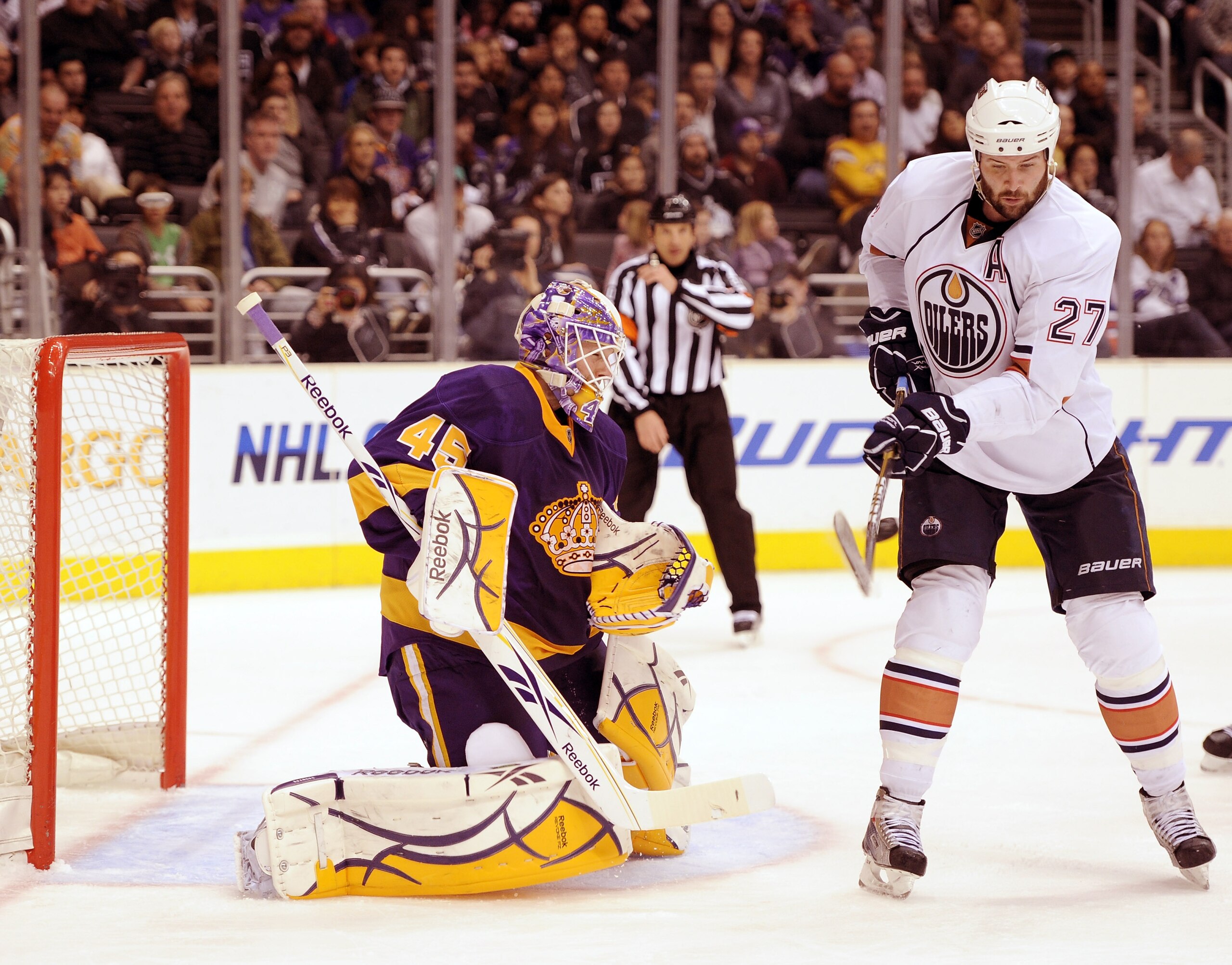 LOS ANGELES, CA - JANUARY 15: Dustin Penner #27 of the Edmonton Oilers attempts a deflection on Jonathan Bernier #45 of the Los Angeles Kings at the Staples Center on January 15, 2011 in Los Angeles, California. (Photo by Harry How/Getty Images) LOS ANGELES, CA - JANUARY 15: Dustin Penner #27 of the Edmonton Oilers attempts a deflection on Jonathan Bernier #45 of the Los Angeles Kings at the Staples Center on January 15, 2011 in Los Angeles, California. (Photo by Harry How/Getty Images)