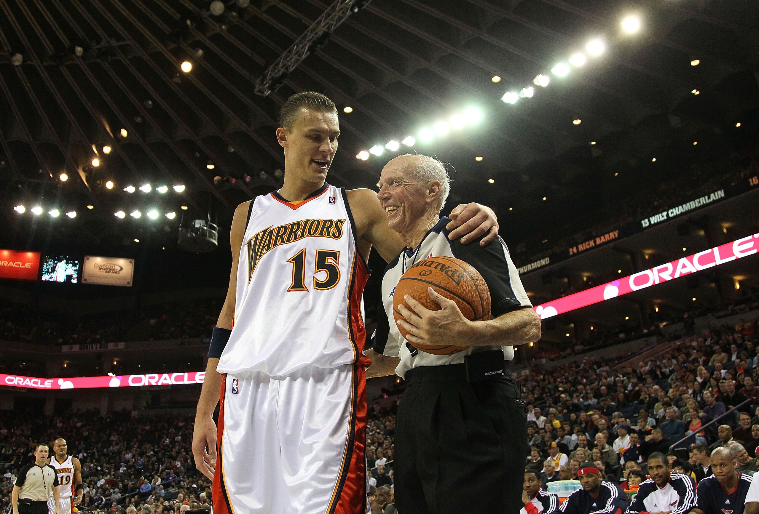 OAKLAND, CA - FEBRUARY 21:  Andris Biedrins #15 of the Golden State Warriors talks with referee Dick Bavetta during an NBA game at Oracle Arena at Oracle Arena on February 21, 2010 in Oakland, California.  NOTE TO USER: User expressly acknowledges and agr