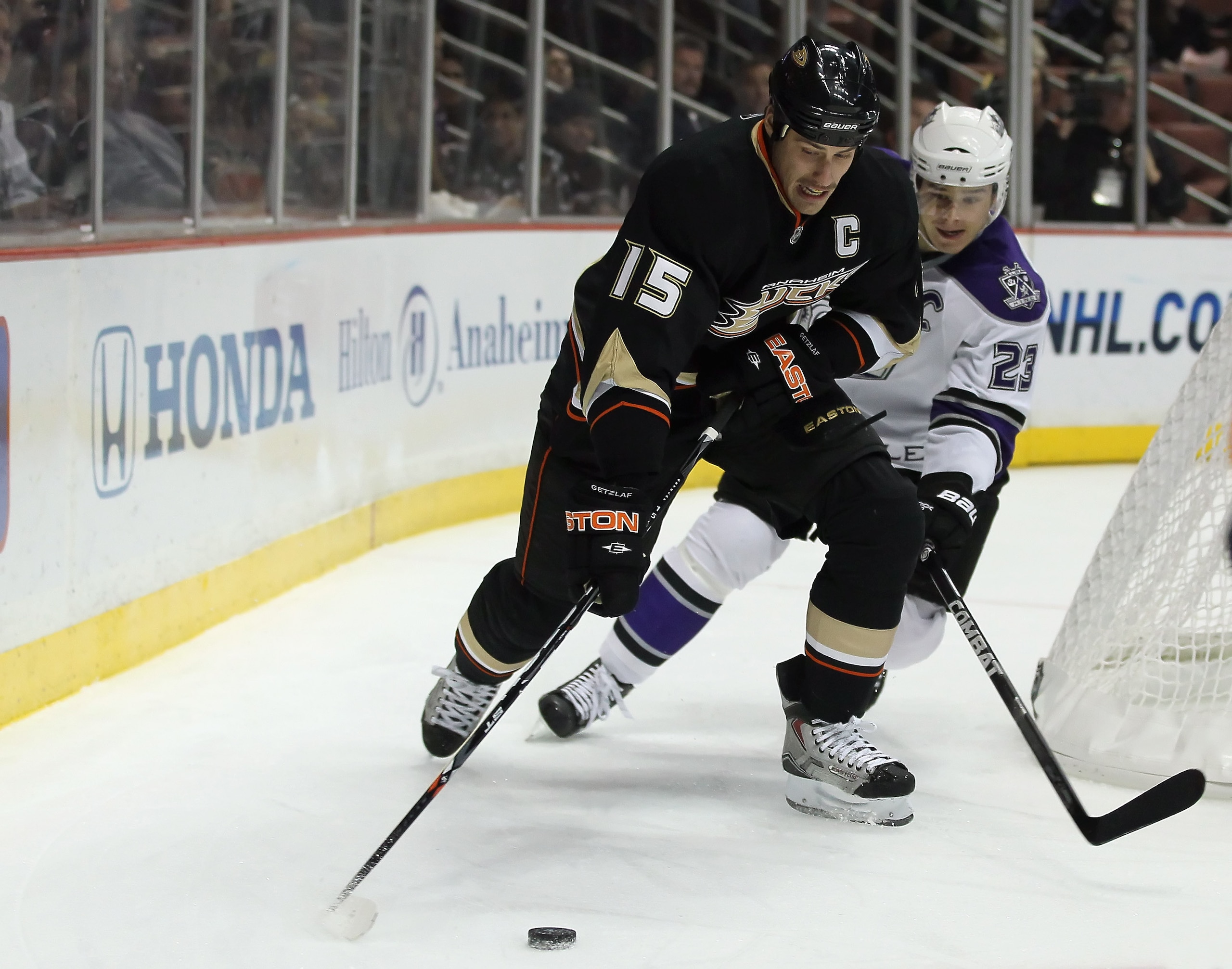 ANAHEIM, CA - NOVEMBER 29: Ryan Getzlaf #15 of the Anaheim Ducks and Dustin Brown #23 of the Los Angeles Kings battle for the puck at the Honda Center on November 29, 2010 in Anaheim, California. (Photo by Jeff Gross/Getty Images) ANAHEIM, CA - NOVEMBER 29: Ryan Getzlaf #15 of the Anaheim Ducks and Dustin Brown #23 of the Los Angeles Kings battle for the puck at the Honda Center on November 29, 2010 in Anaheim, California. (Photo by Jeff Gross/Getty Images)
