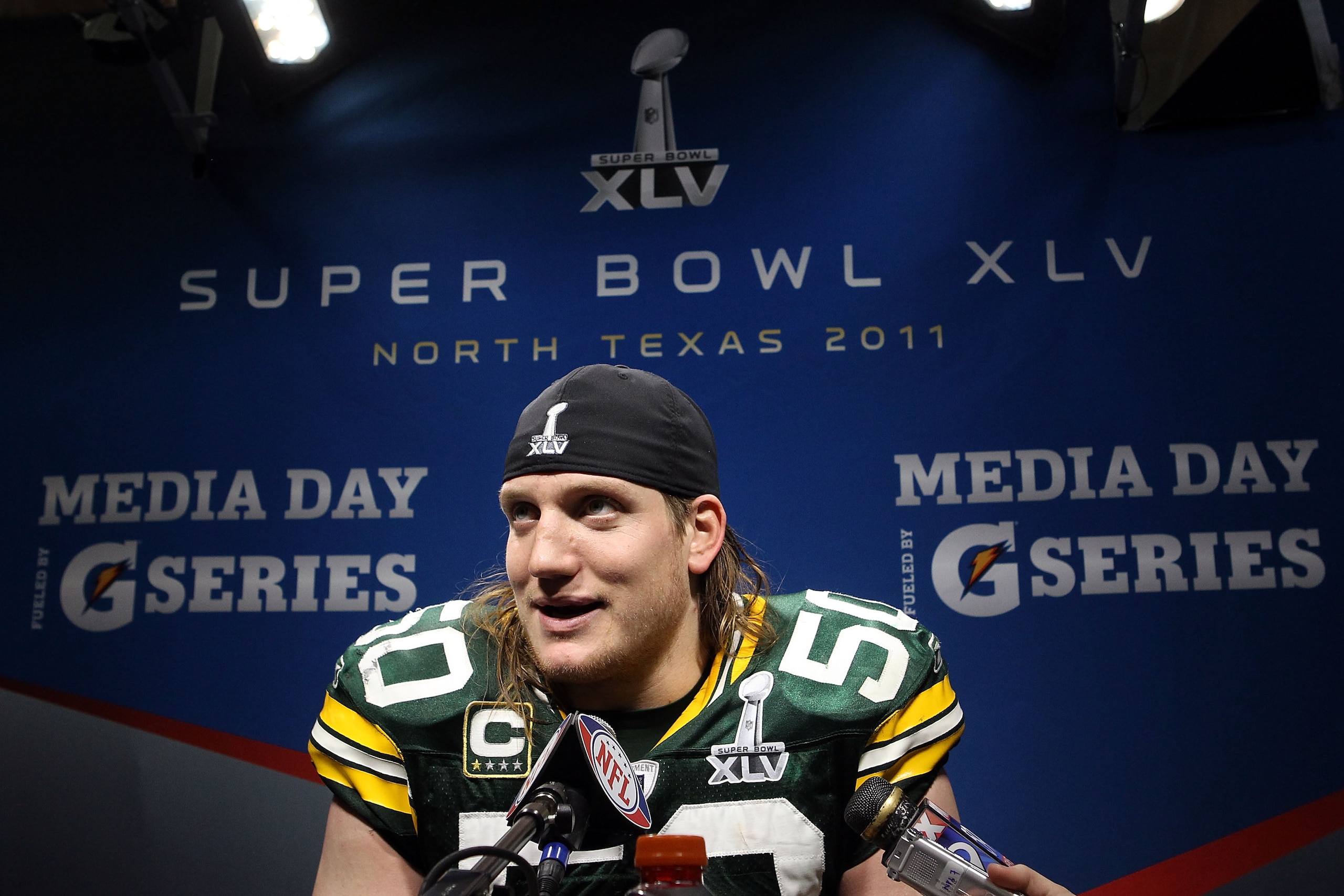ARLINGTON, TX - FEBRUARY 06:  A.J. Hawk #50 of the Green Bay Packers is interviewed after the Packers defeated the Pittsburgh Steelers 31 to 25 in Super Bowl XLV at Cowboys Stadium on February 6, 2011 in Arlington, Texas.  (Photo by Ronald Martinez/Getty