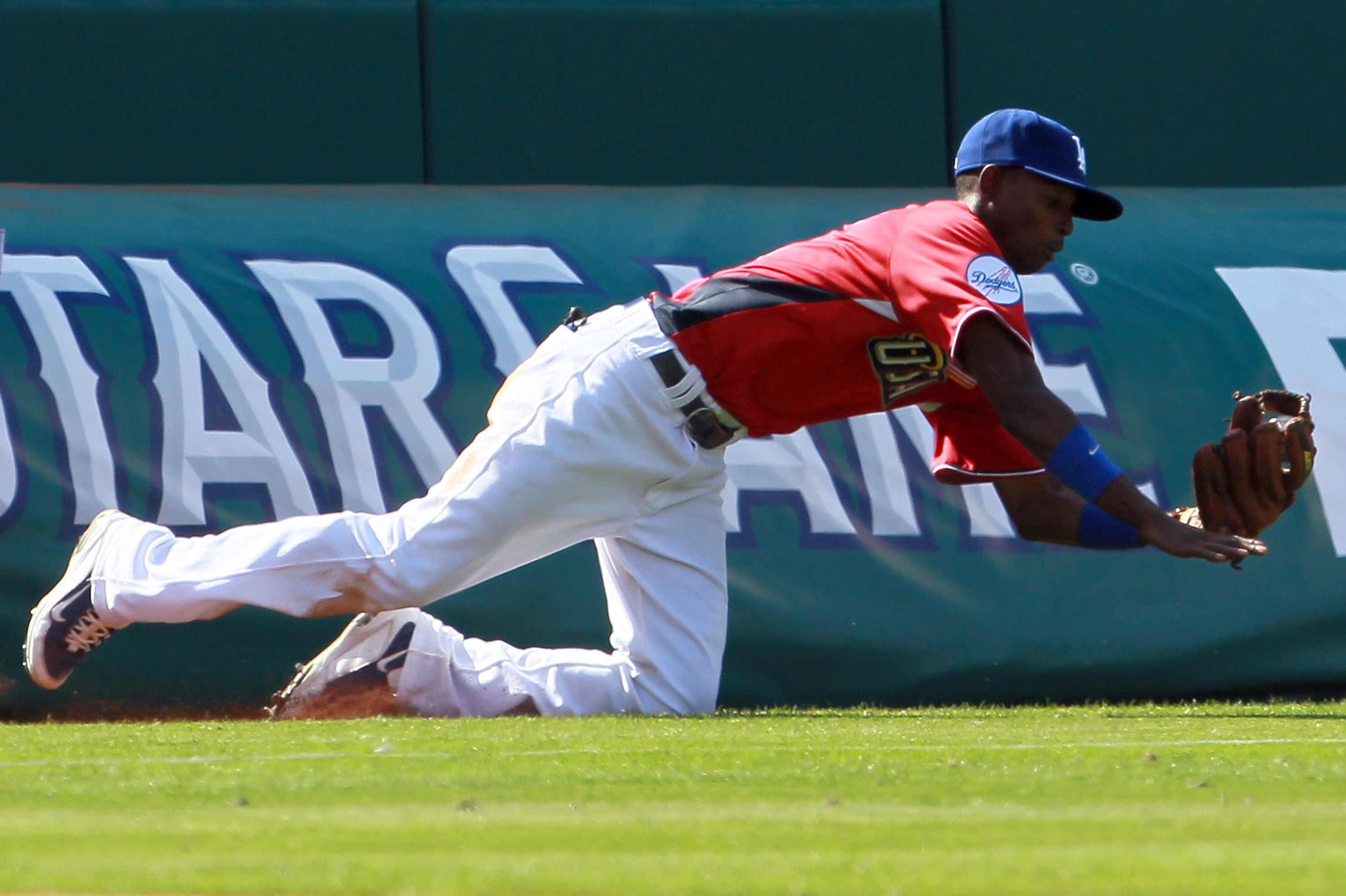 ANAHEIM, CA - JULY 11:  U.S. Futures All-Star Dee Gordon #5 of the Los Angeles Dodgers dives for the ball during the 2010 XM All-Star Futures Game at Angel Stadium of Anaheim on July 11, 2010 in Anaheim, California.  (Photo by Jeff Gross/Getty Images)