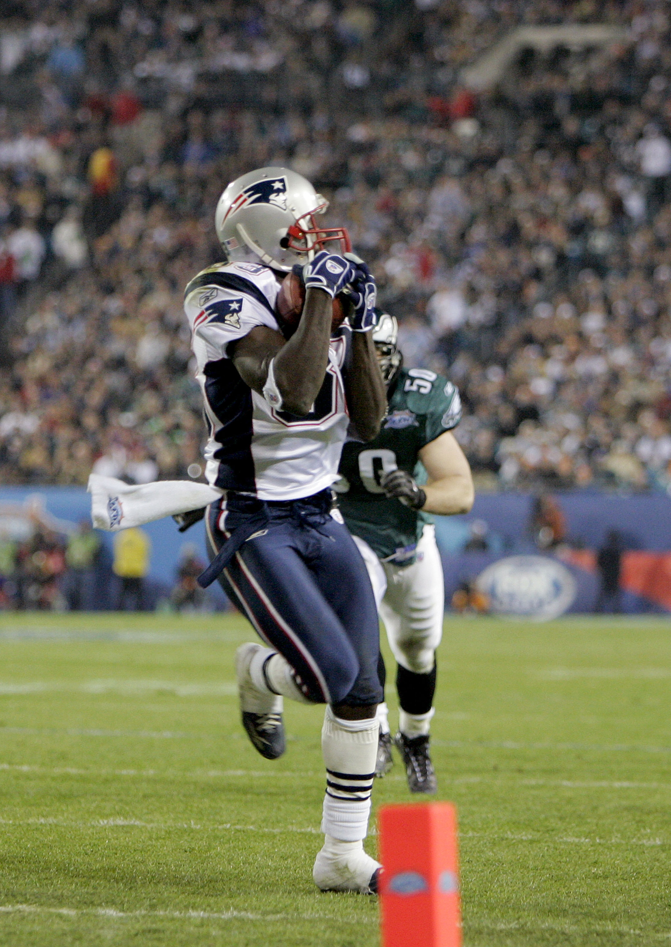JACKSONVILLE, FL - FEBRUARY 06:  Wide receiver Deion Branch #83 of the New England Patriots makes a 21-yard catch against the Philadelphia Eagles in the third quarter during Super Bowl XXXIX at Alltel Stadium on February 6, 2005 in Jacksonville, Florida.
