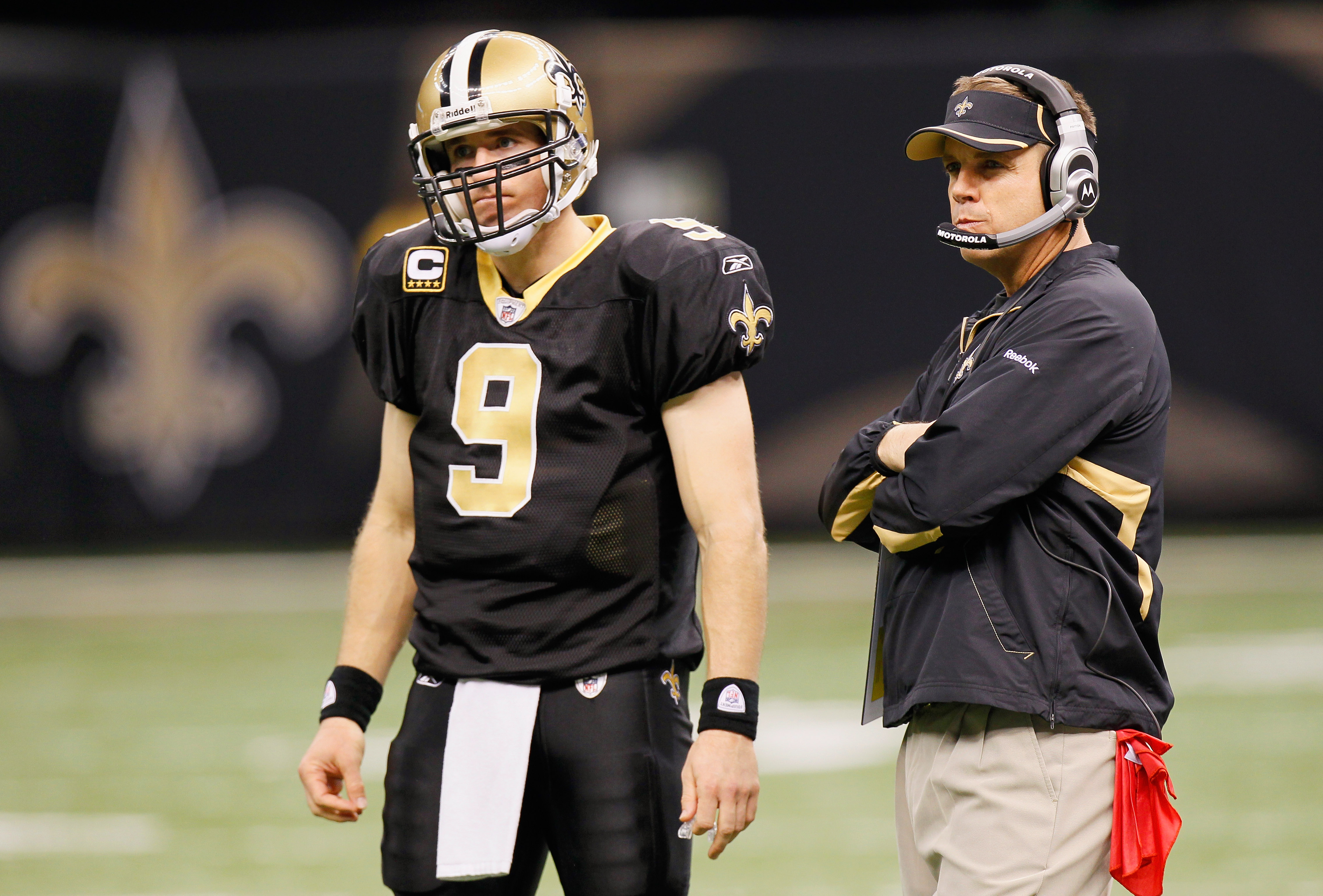 NEW ORLEANS - NOVEMBER 21:  Quarterback Drew Brees #9 and head coach Sean Payton of the New Orleans Saints wait for the call from a review against the Seattle Seahawks at Louisiana Superdome on November 21, 2010 in New Orleans, Louisiana.  (Photo by Kevin