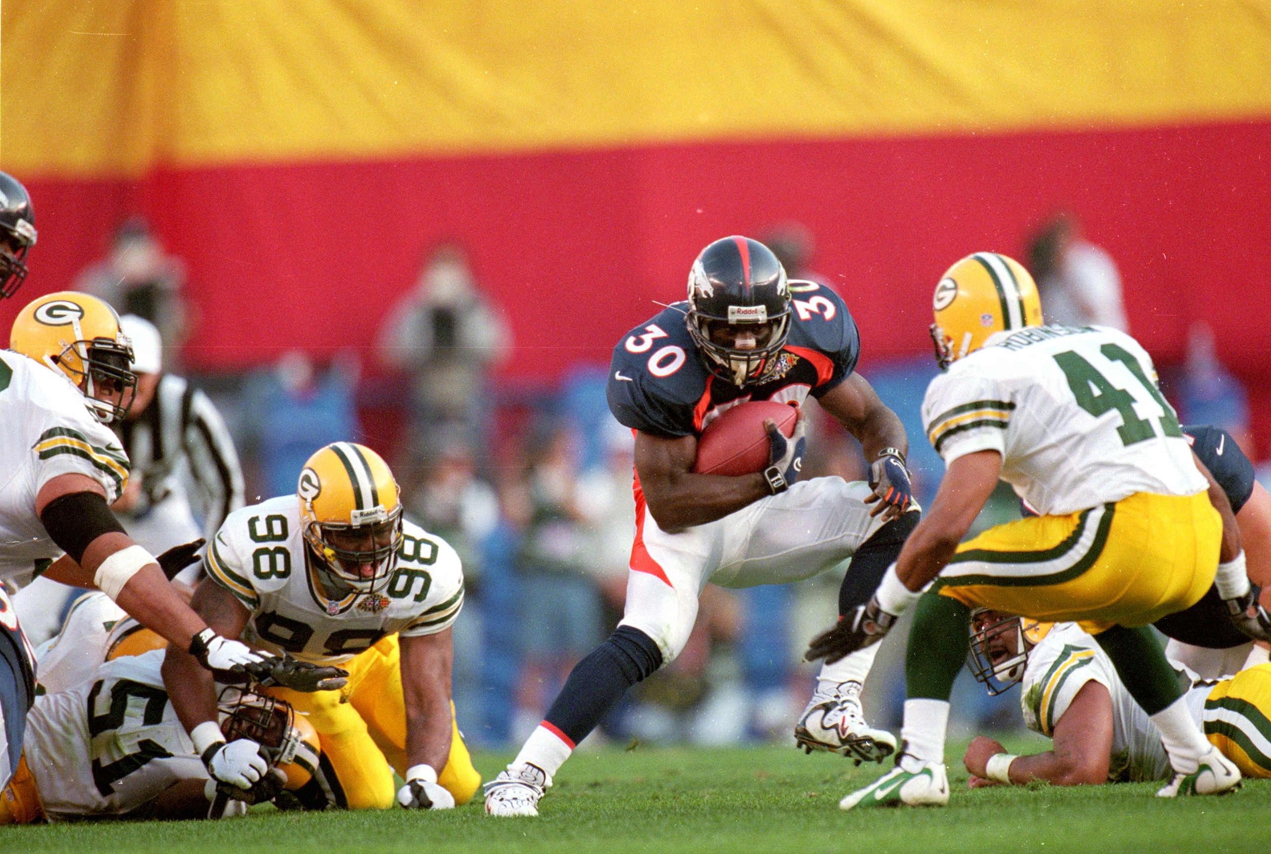 25 Jan 1998:  Terrell Davis #30 of the Denver Broncos in action during the NFL Super Bowl XXXII Game against the Green Bay Packers at the Qualcomm Stadium in San Diego, California. The Broncos defeated the Packers 31-24. Mandatory Credit: Doug Pensinger