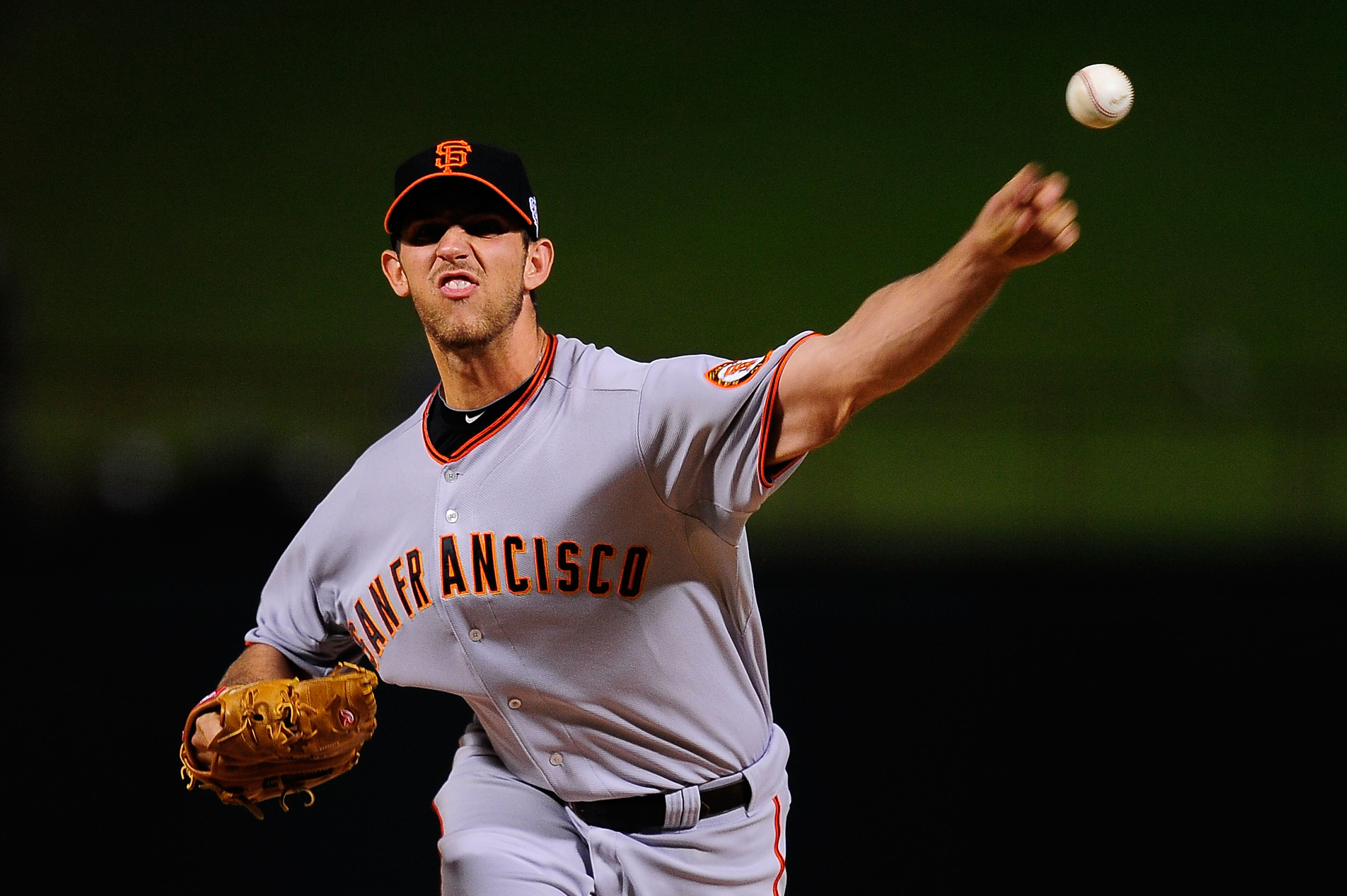 San Francisco Giants pitcher Jonathan Sanchez reacts after walking