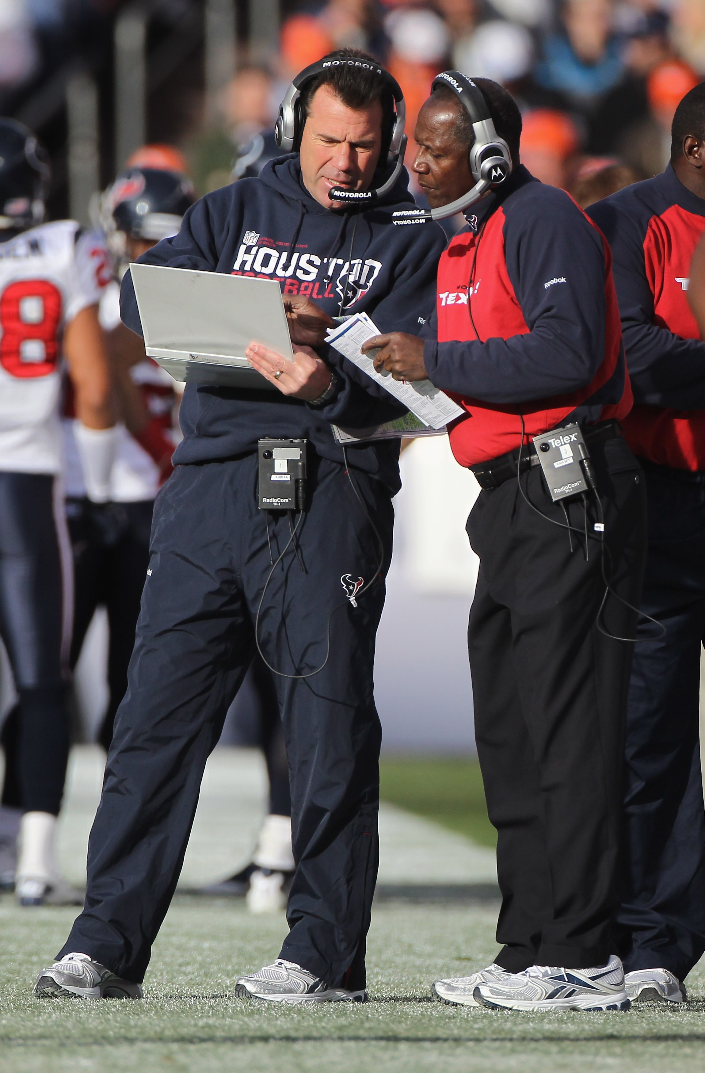 DENVER - DECEMBER 26:  (L-R) Head coach Gary Kubiak of the Houston Texas talks with wide receivers coach Larry Kirksey as they face the Denver Broncos at INVESCO Field at Mile High on December 26, 2010 in Denver, Colorado. The Broncos defeated the Texans