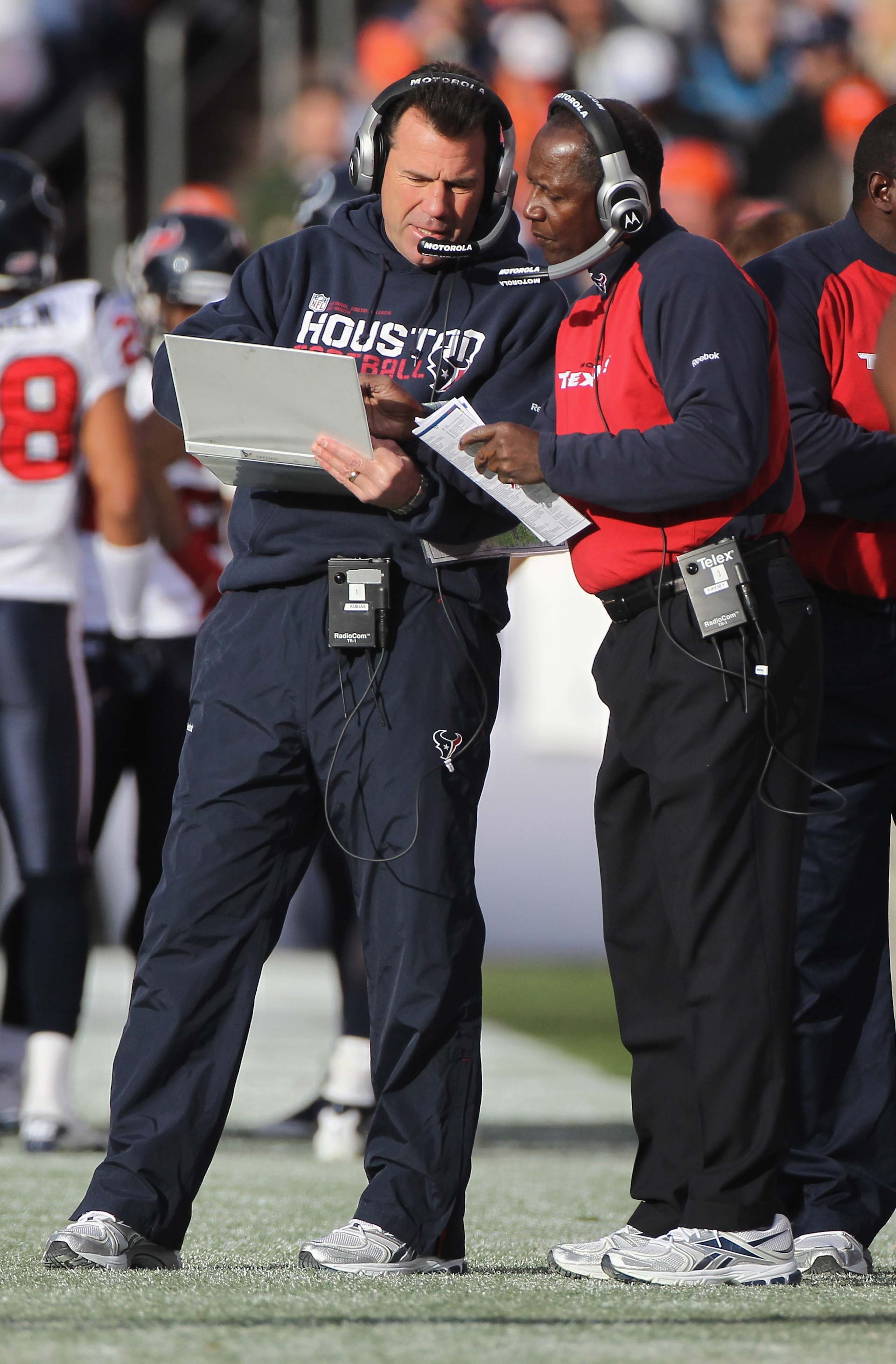 DENVER - DECEMBER 26:  (L-R) Head coach Gary Kubiak of the Houston Texas talks with wide receivers coach Larry Kirksey as they face the Denver Broncos at INVESCO Field at Mile High on December 26, 2010 in Denver, Colorado. The Broncos defeated the Texans