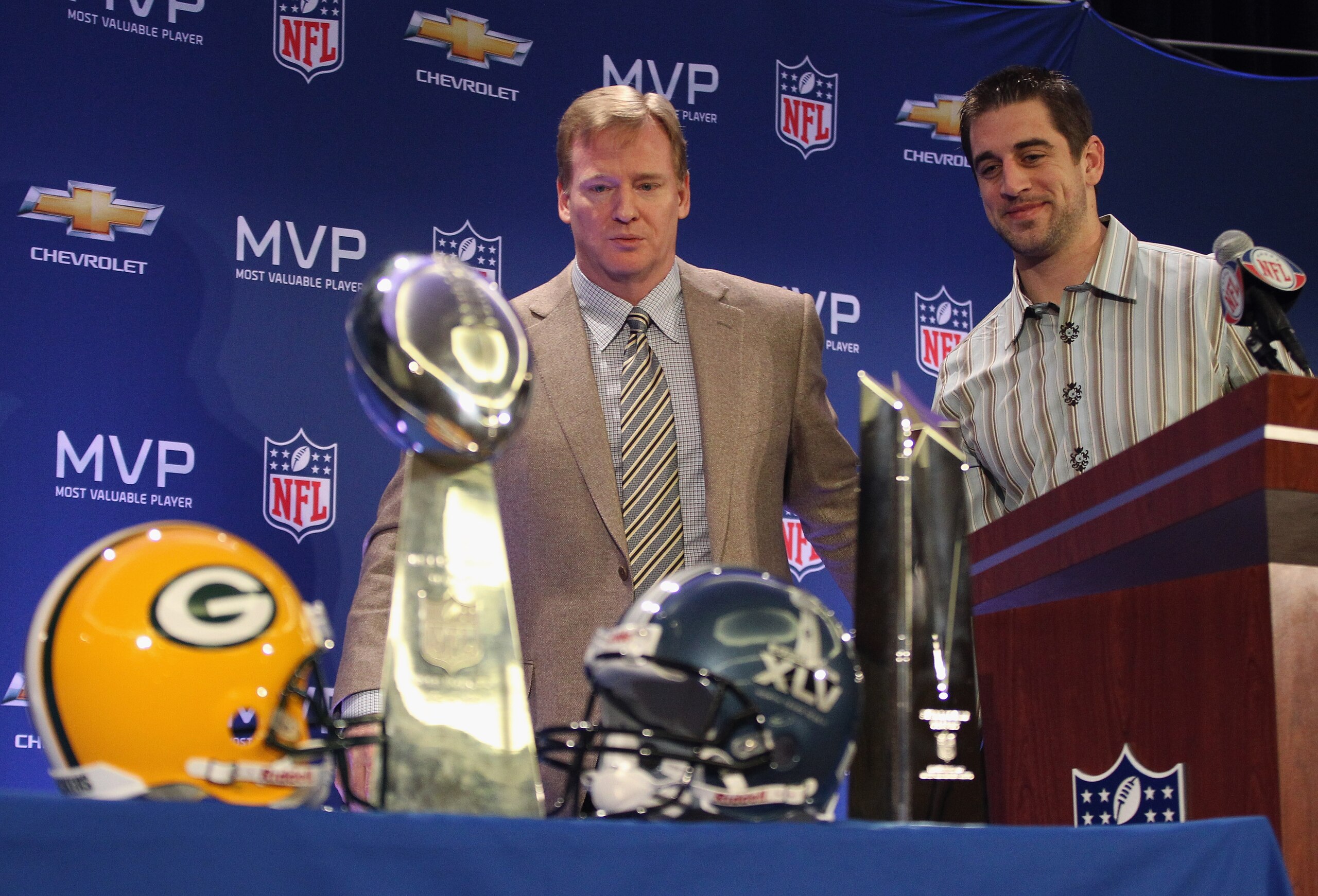 DALLAS, TX - FEBRUARY 07:  NFL Commissioner Roger Goodell (L) and Green Bay Packers quarterback Aaron Rodgers (R) look on after speaking to the media during a press conference at Super Bowl XLV Media Center on February 7, 2011 in Dallas, Texas.  (Photo by