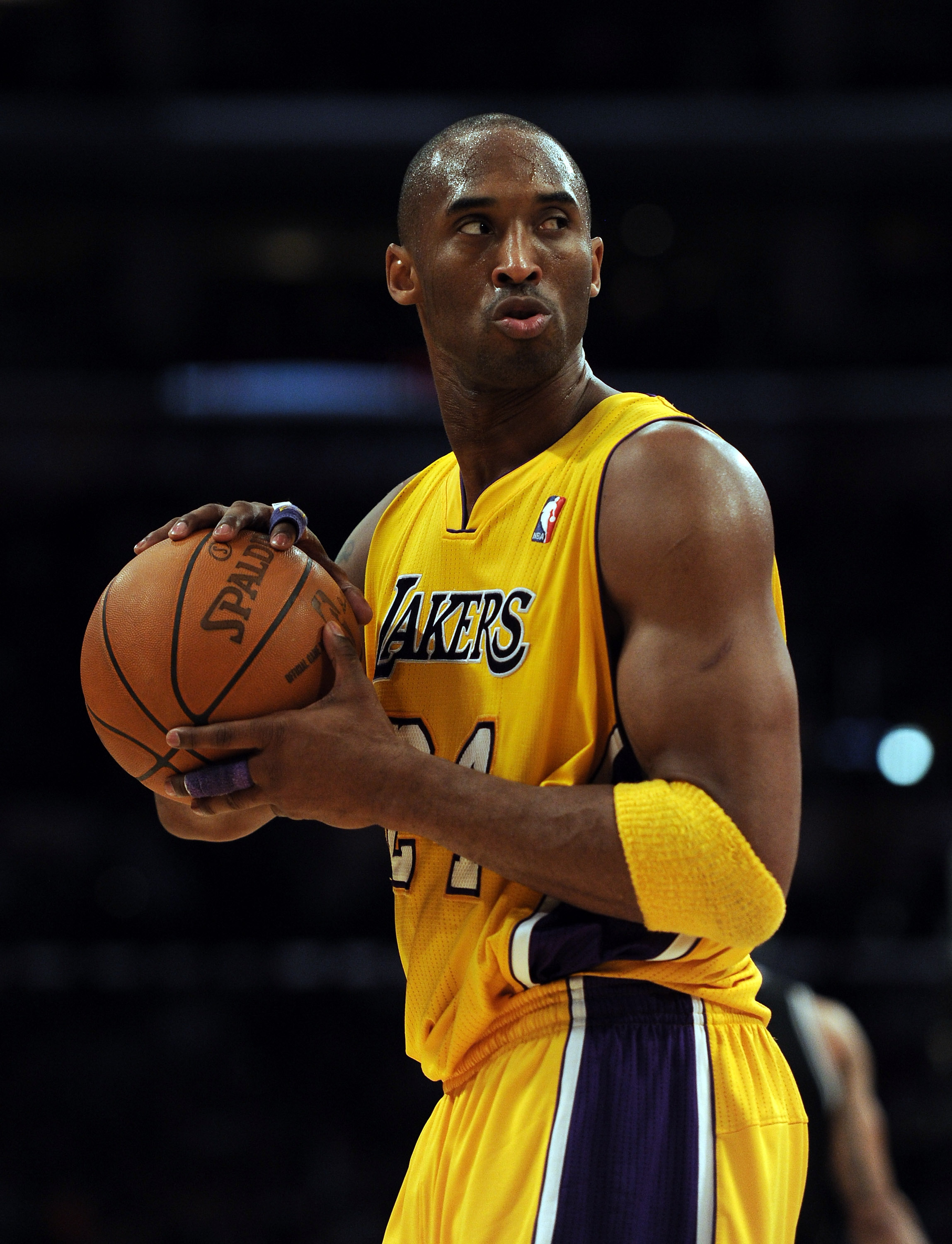 LOS ANGELES, CA - FEBRUARY 03:  Kobe Bryant #24 of the Los Angeles Lakers reacts to his defense during a stop in play against the San Antonio Spurs during the first half at Staples Center on February 3, 2011 in Los Angeles, California.  NOTE TO USER: User