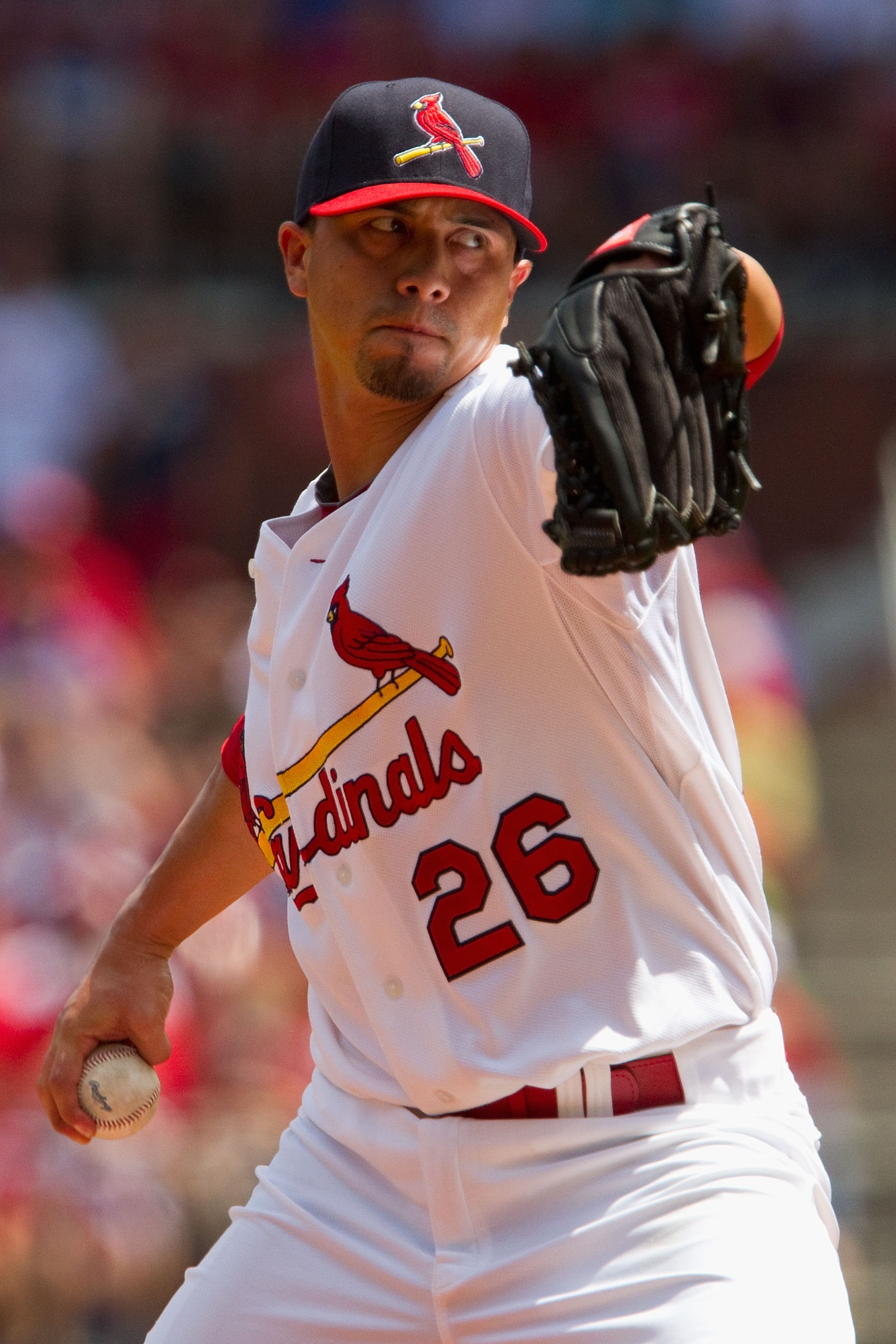 ST. LOUIS - AUGUST 15: Starting pitcher Kyle Lohse #26 of the St. Louis Cardinals throws against the Chicago Cubs at Busch Stadium on August 15, 2010 in St. Louis, Missouri.  The Cubs beat the Cardinals 9-7.  (Photo by Dilip Vishwanat/Getty Images)