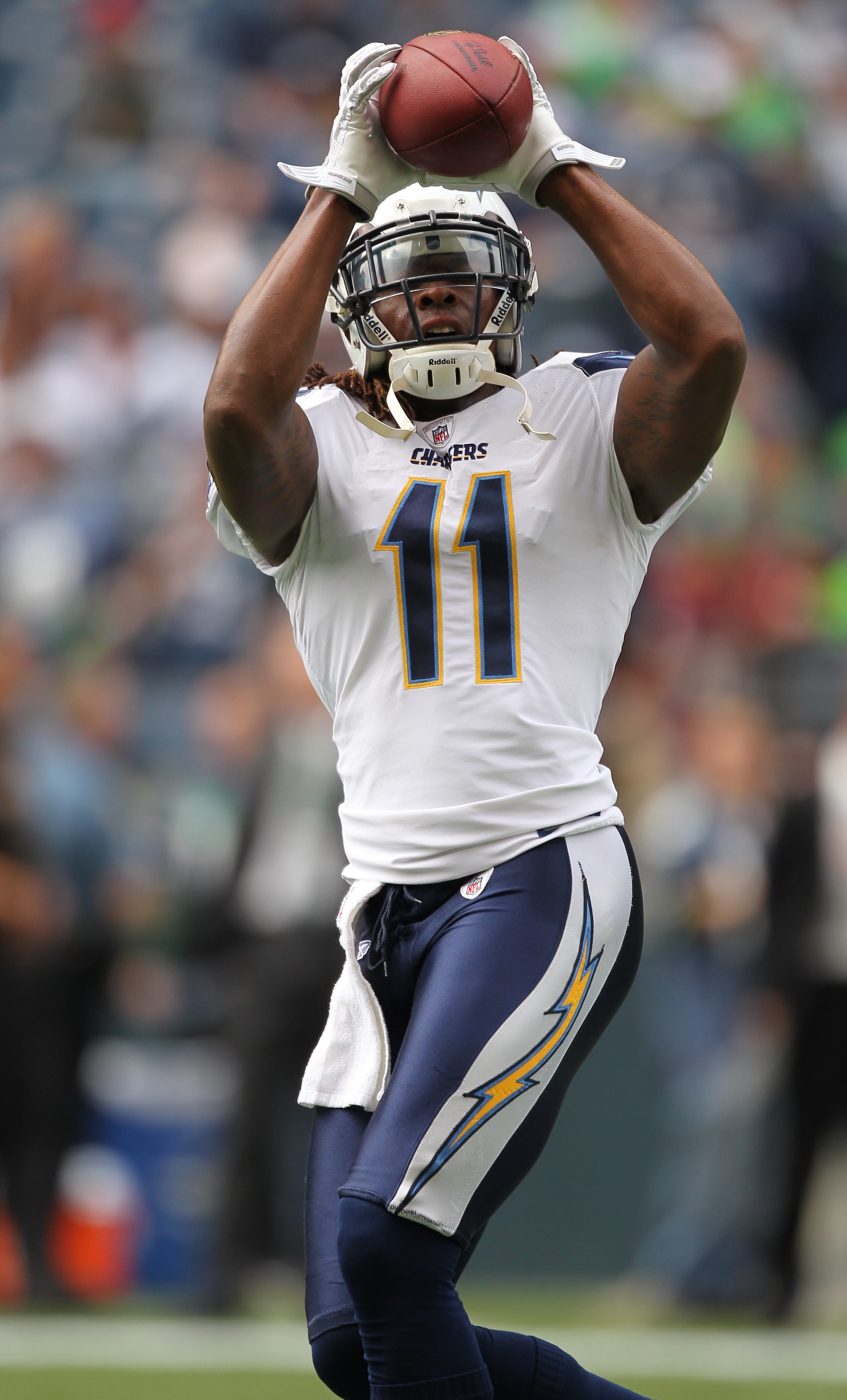 SEATTLE - SEPTEMBER 26:  Wide receiver Legedu Naanee #11 of the San Diego Chargers makes a catch during warmups prior to the game against the Seattle Seahawks at Qwest Field on September 26, 2010 in Seattle, Washington. (Photo by Otto Greule Jr/Getty Imag