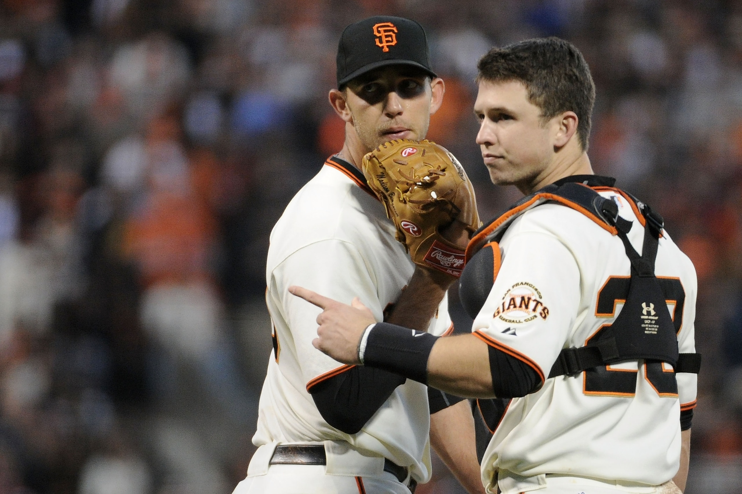 SAN FRANCISCO - OCTOBER 20:  Madison Bumgarner #40 of the San Francisco Giants talks with Buster Posey #28 in the fifth inning against the Philadelphia Phillies in Game Four of the NLCS during the 2010 MLB Playoffs at AT&T Park on October 20, 2010 in San